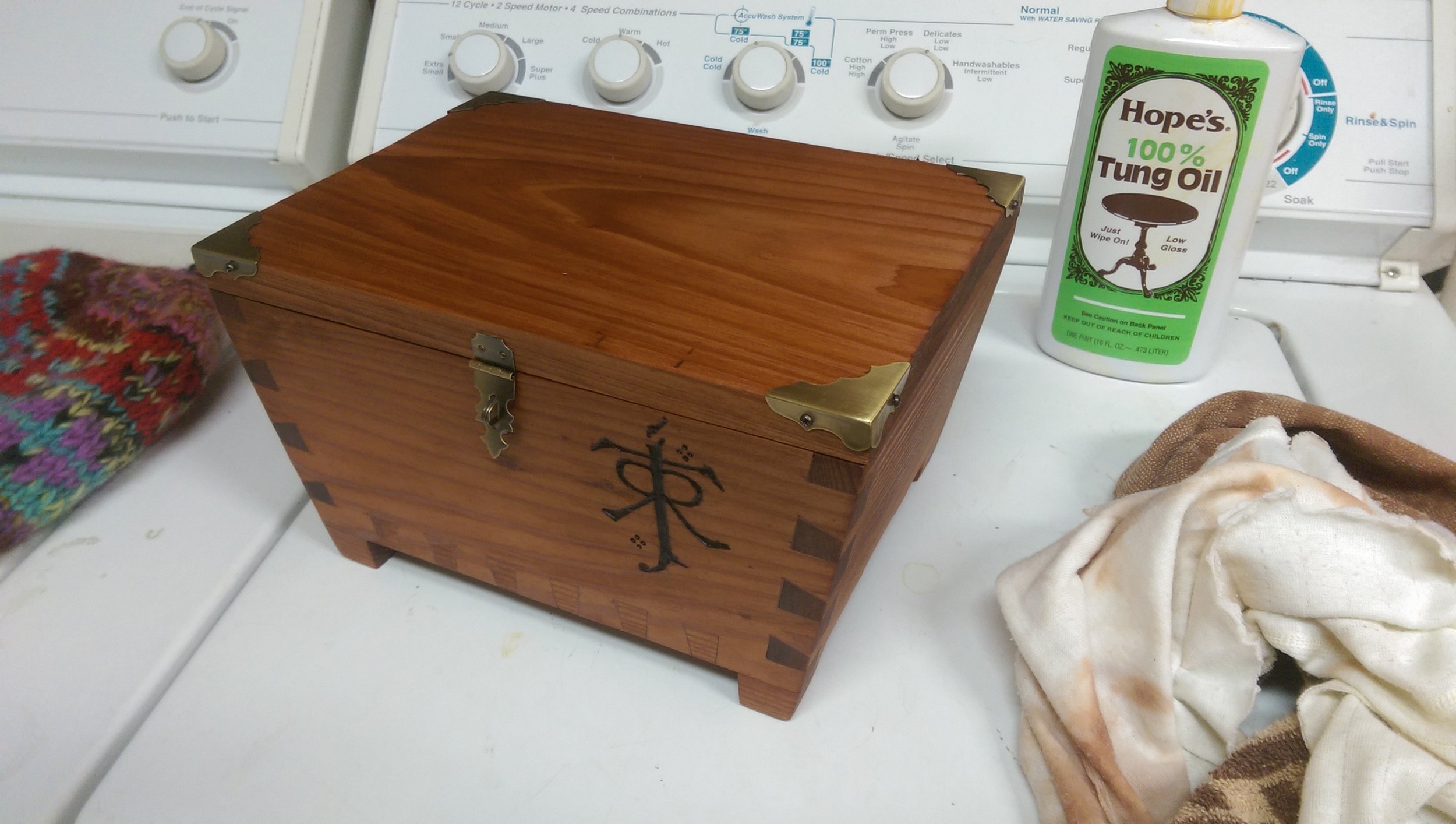  Finally I finished the box with several layers of tung oil. This really brought out the charred emblem and the wood’s grain. Definitely the most satisfying part of the build! 