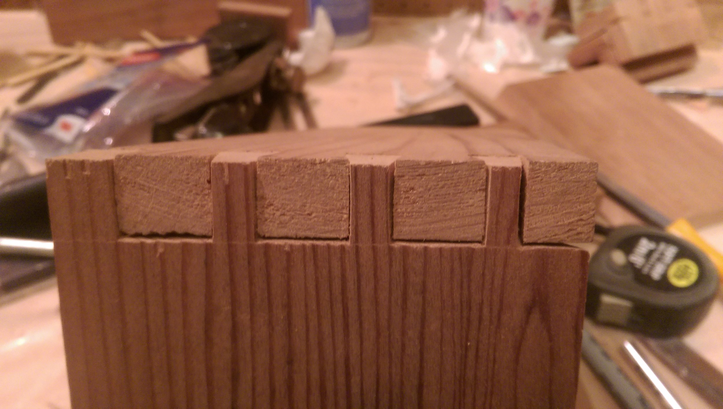  After a bit of massaging with a file, I managed to fit my first joint together. The test fit pretty clearly shows I’m an amateur at hand-cutting dovetail joints. The gaps are embarrassingly large. I was still excited when everything fit together tho