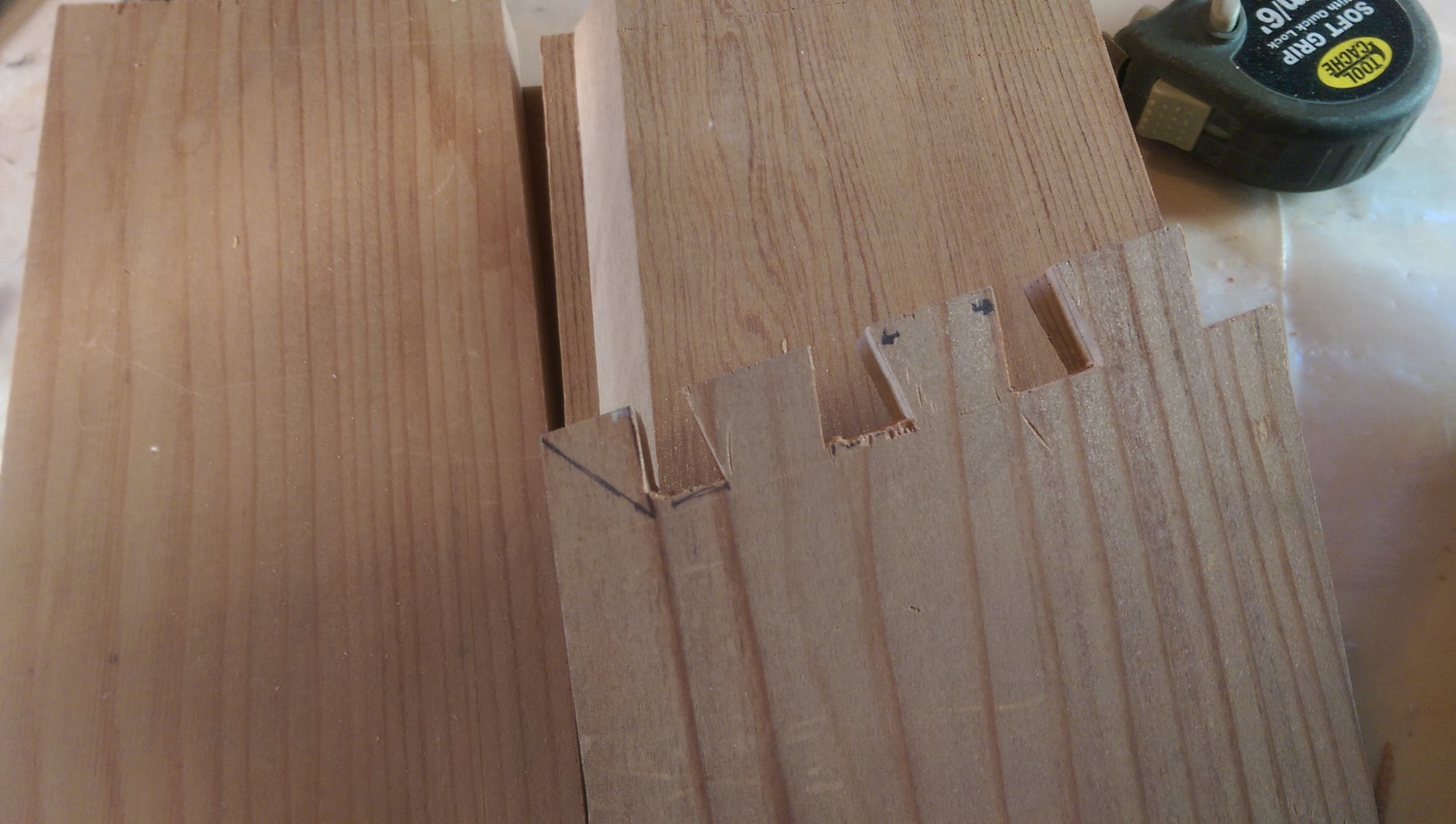  The front or the back with the dovetails cut. The spaces on the right are filed, the ones on the left aren’t yet. 