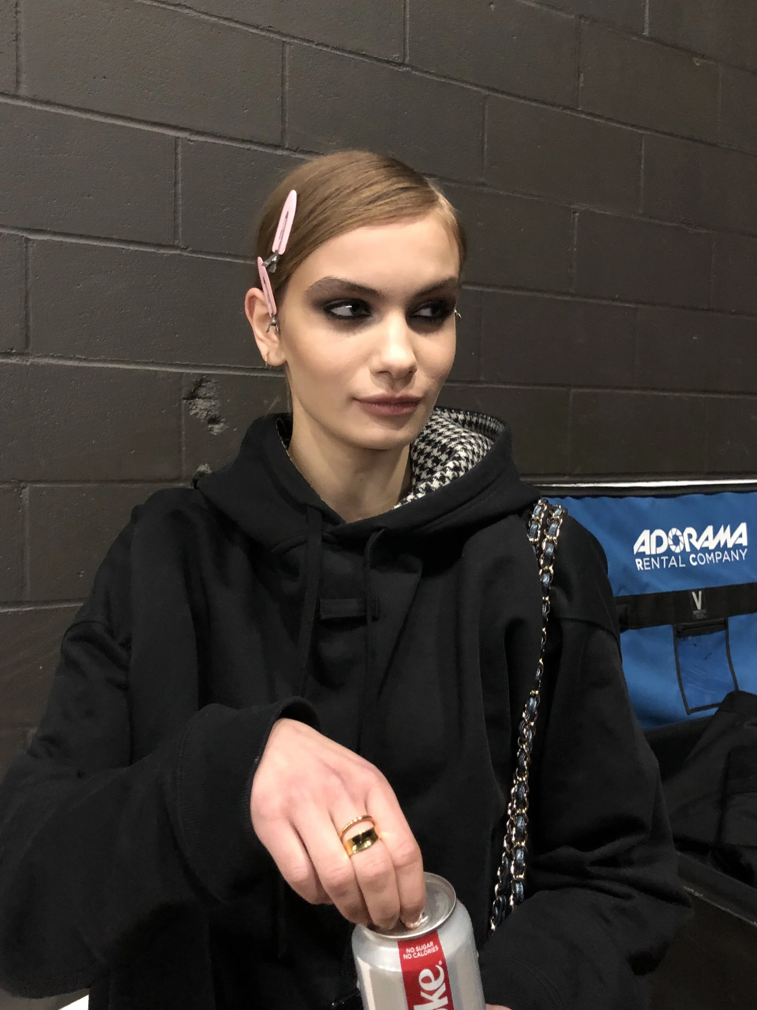 A diet coke break with smoky eyes.