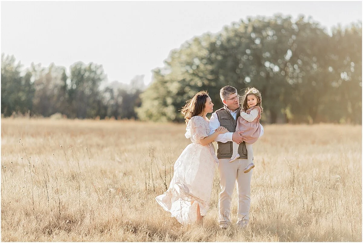 Flower Mound Family Photographer, Dallas family photography, studio session, family giggling on bed, black and white portrait, dfw family photographer, colleyville photographer, southlake family photographer, coppell family photography