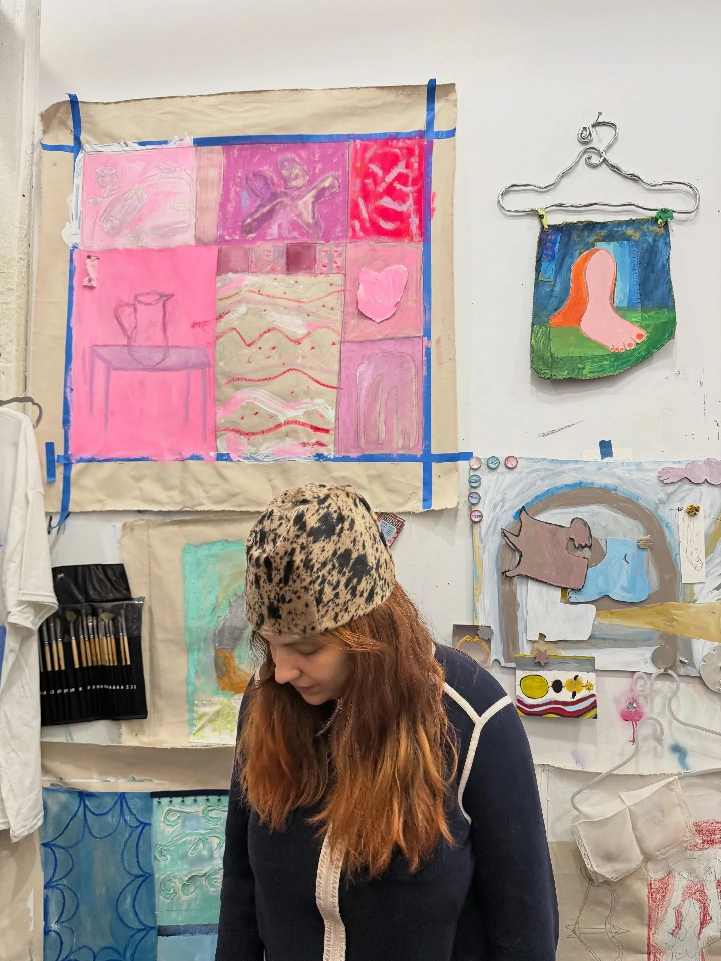 Maira Senise @mairasenise in her Brooklyn studio wearing the FW25 Pony Beanie. Always fun to step into her dream world 🎀🌀✏️☁️