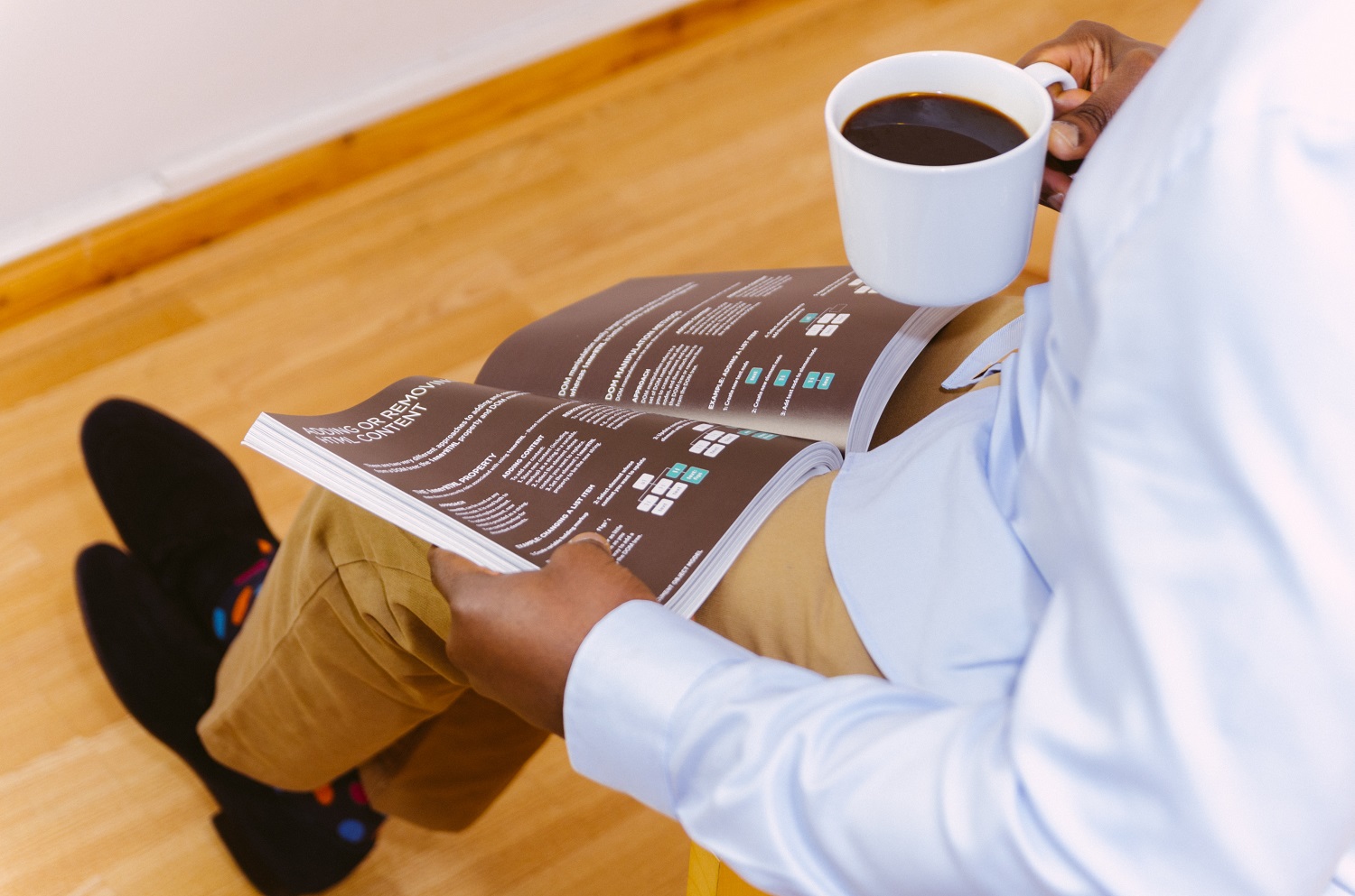 man in suit reading book.jpg