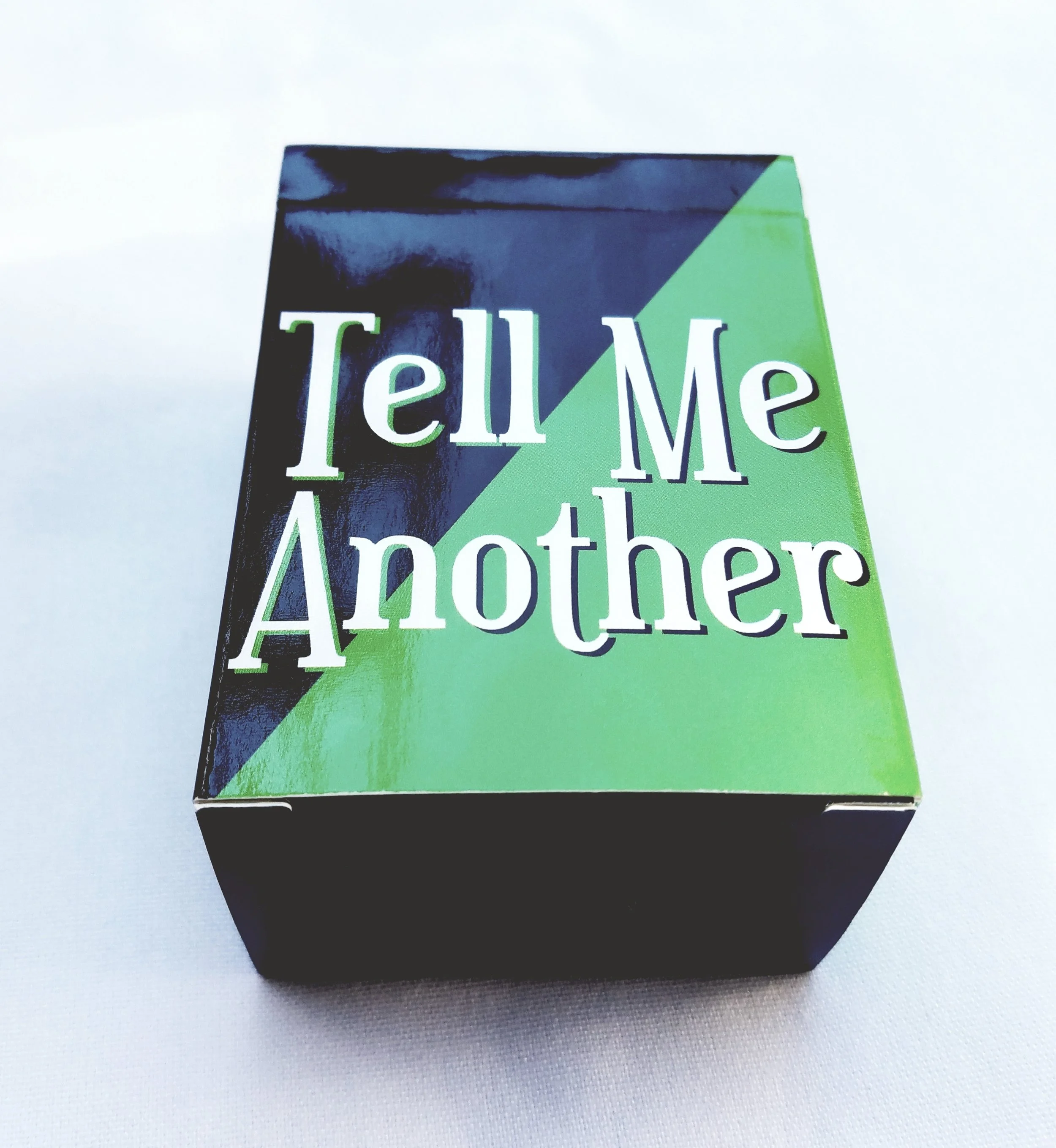 The Tell Me Another Box filled with storytelling prompts sure to ignite interesting conversation.
