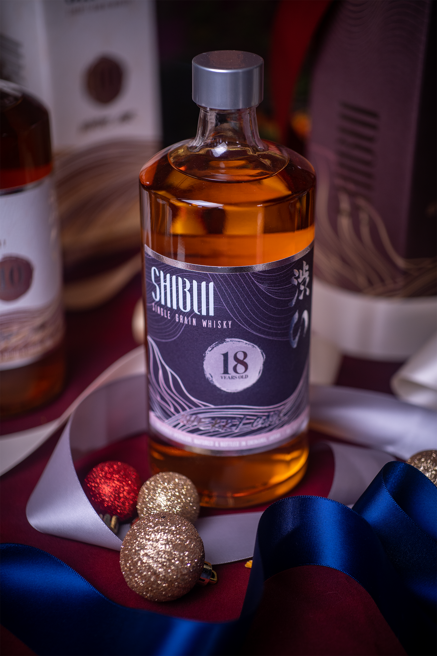 Shibui holiday 2022 whisky 18 year with xmas ornaments.png