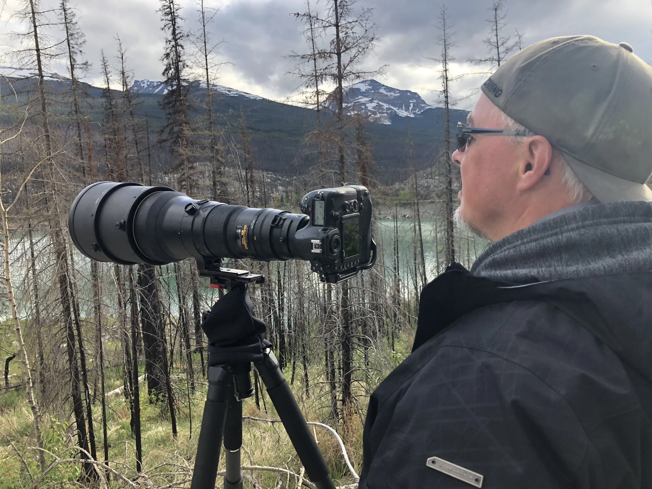 RON PHOTOGRAPHING IN ROCKIES.JPG