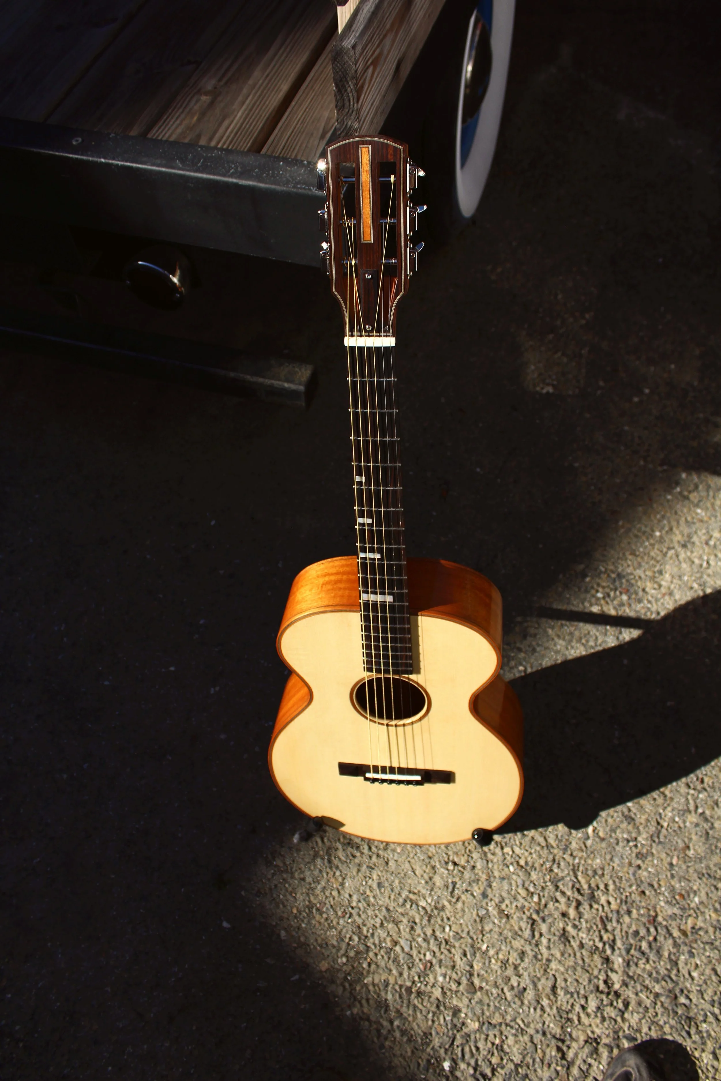 mahogany guitar in sunlight