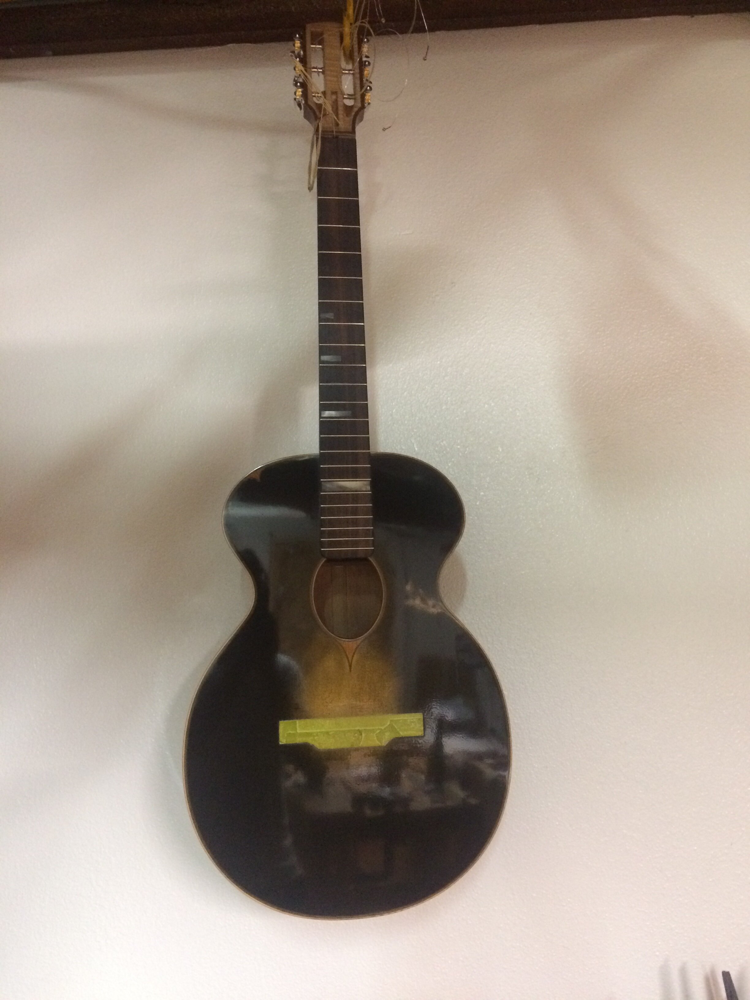 French polished guitar hanging out