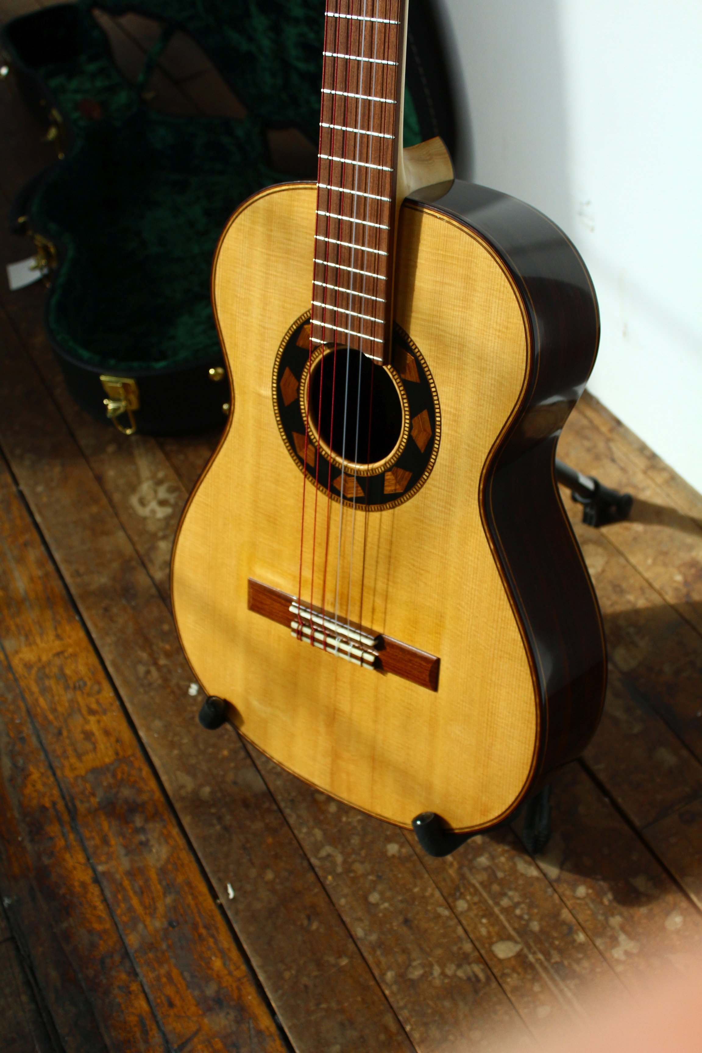 classical model nylon guitar in the afternoon spring light in brattleboro vermont