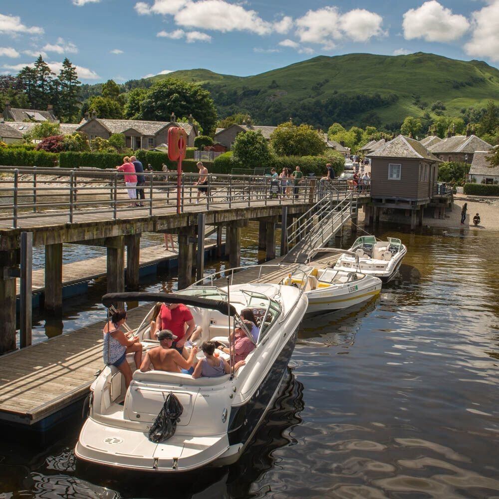 Looking back from the end of Luss Pier. We have guides to many of the towns, villages, attractions and natural wonders of the National Park at our See Loch Lomond website #seelochlomond #explorelochlomond #villages #luss #pictueresquescotland #scotla