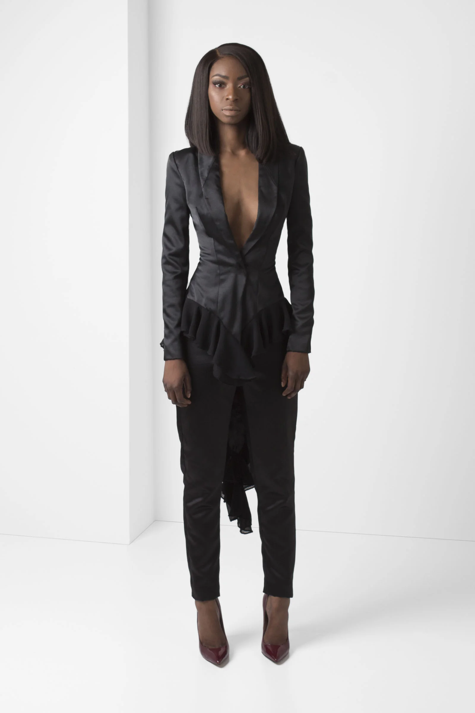 PacoRogiene_NYC_Black_High-Low_Satan_Blazer_with_Georgette_Ruffle_Trim_Satan_High_Waist_Pants_Back_Zip_Detail_Frontview_Ecom_2018_Colored_Expressions_Collection.jpg