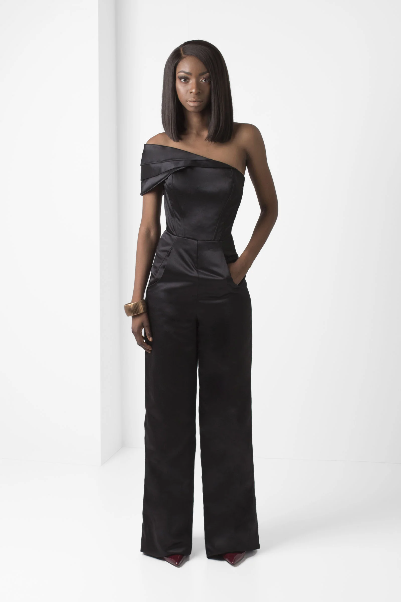 PacoRogiene_NYC_Black_3-Tier_One-Shoulder_Wide-Leg_Jumpsuit_Frontview_Ecom_2018_Colored_Expressions_Collection.jpg