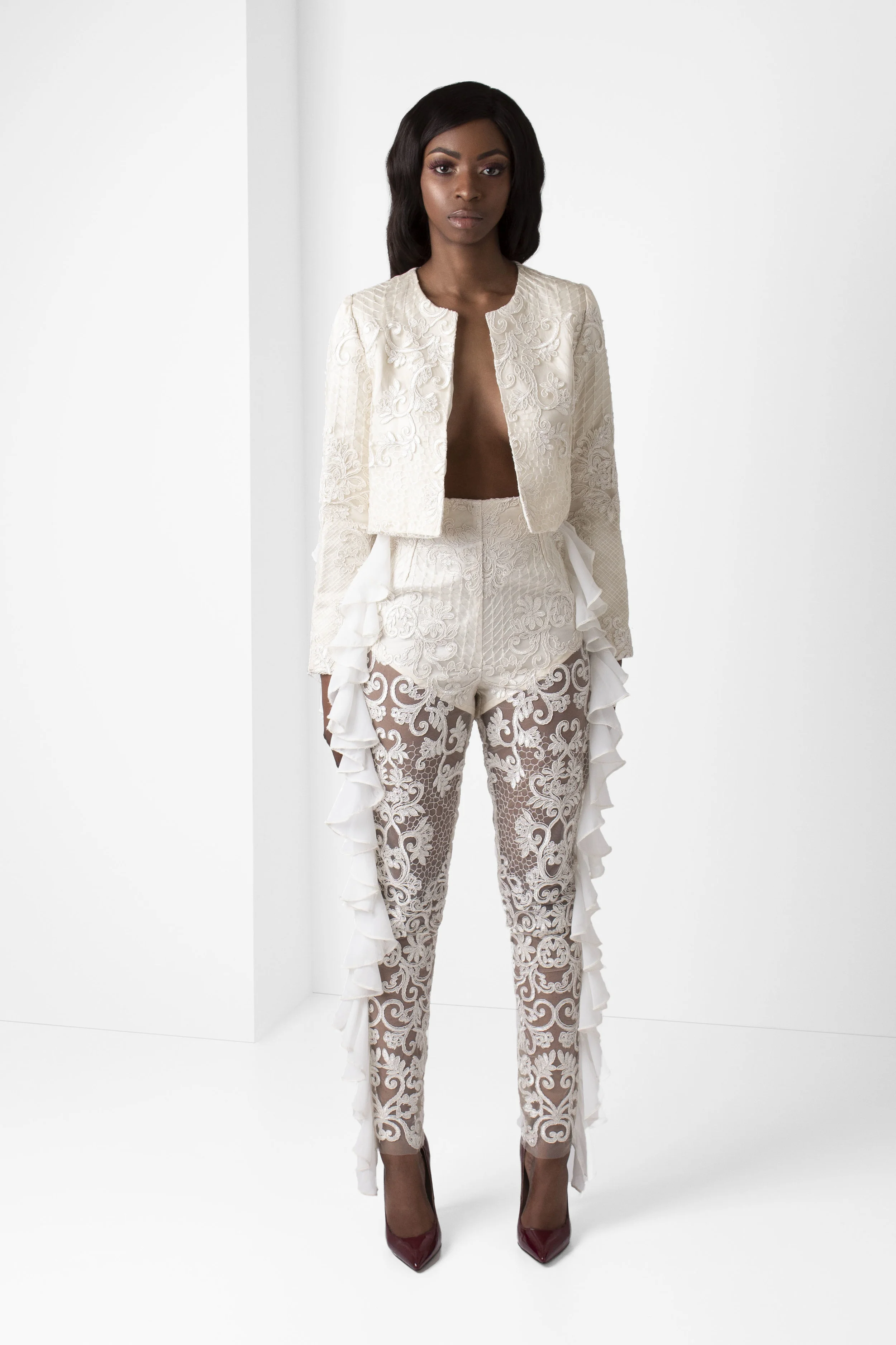 PacoRogiene_NYC_Off_White_Lace_Crop_Jacket__Chiffon-Ruffle-Detail_Unlined_Lace_Pants-Chiffon_Ruffle_Side-Seam_Frontview_Ecom_2018_Colored_Expressions_Collection_V1.jpg