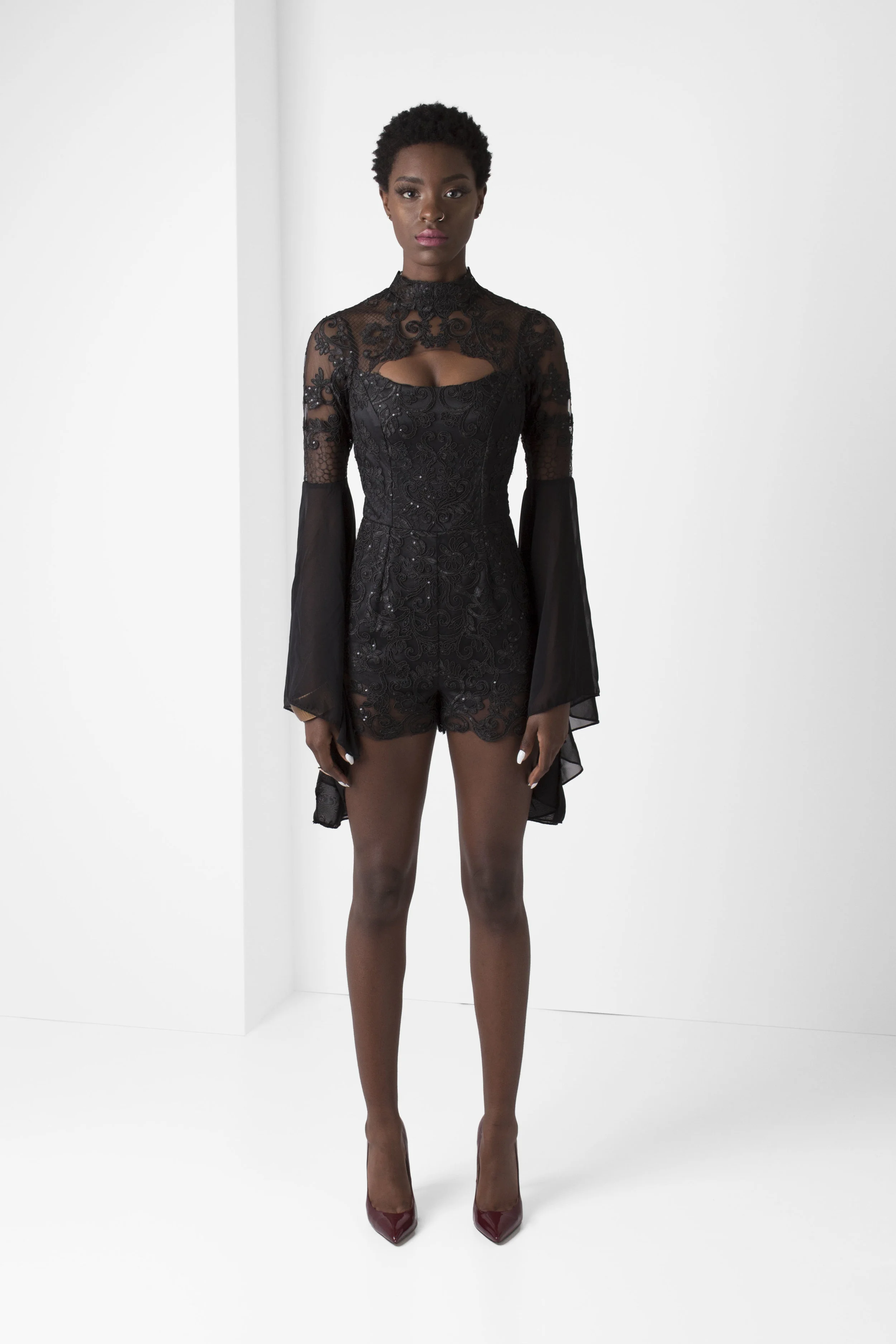 PacoRogiene_NYC_Black_Lace_Romper_Bell_Sleeves_Frontview_Ecom_2018_Colored_Expressions_Collection_V1.jpg