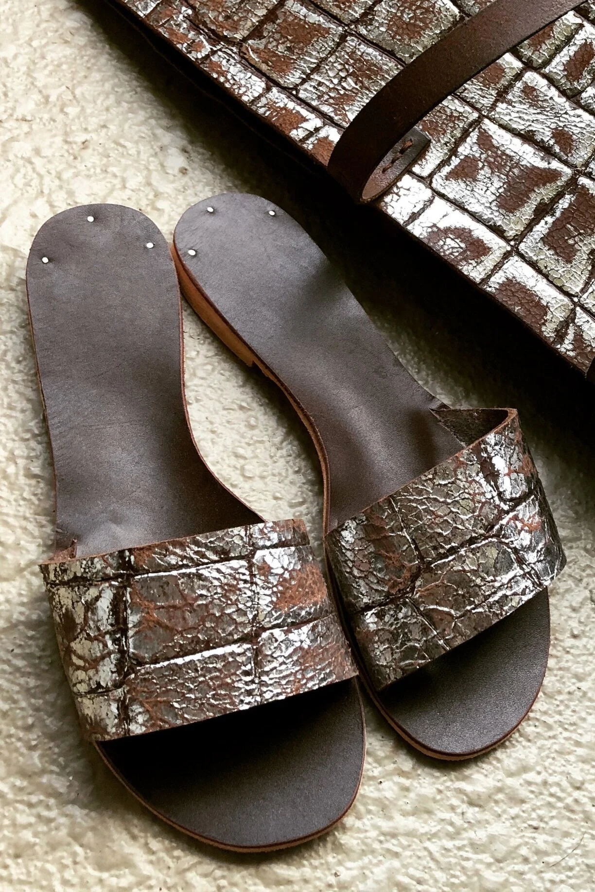 EXPERIMENTS IN SANDAL MAKING