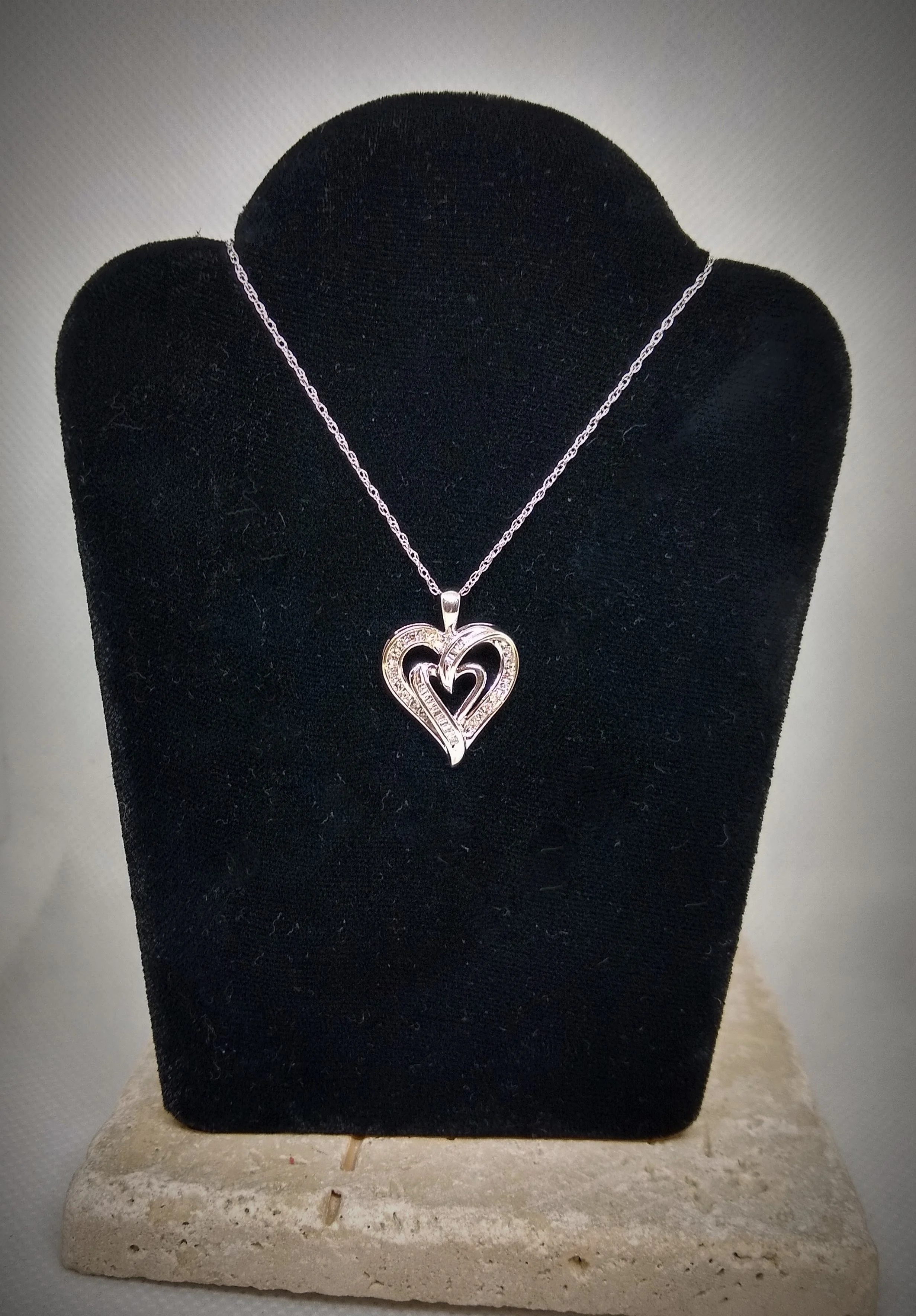 14k White gold diamond  heart pendant and chain.