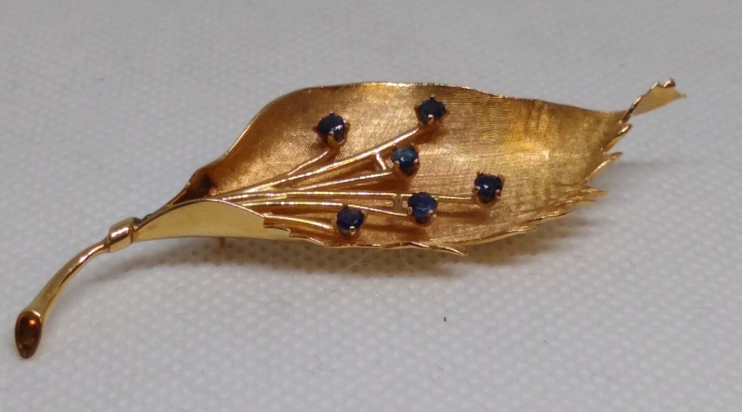 Vintage,Signed EB, 14K Yellow Gold, Fruit Tree Leaf accented w/ natural sapphires.