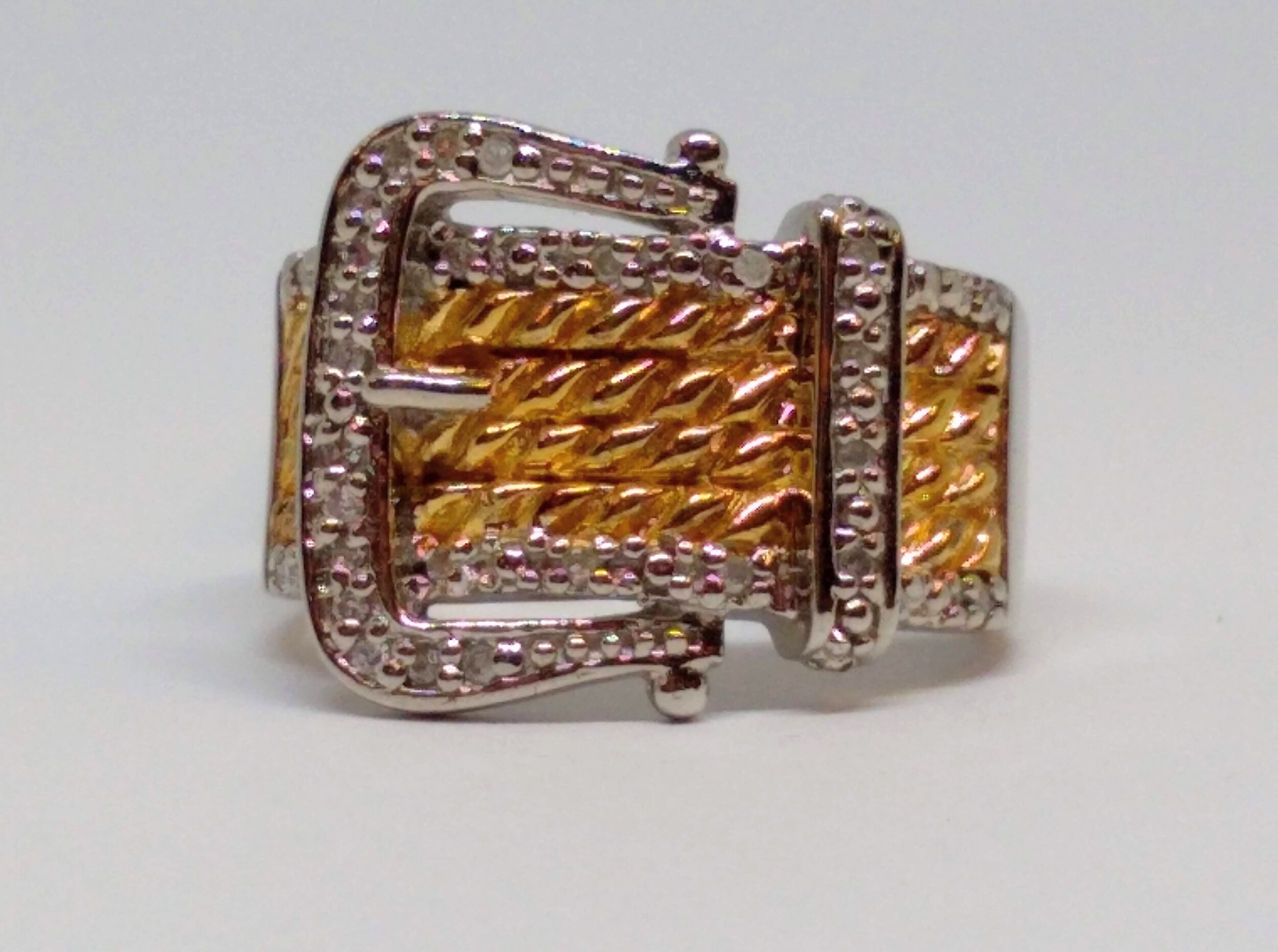 Platinum, 18K YG, over Sterling Silver,Buckle Style Ring with .14 ct-tw diamonds