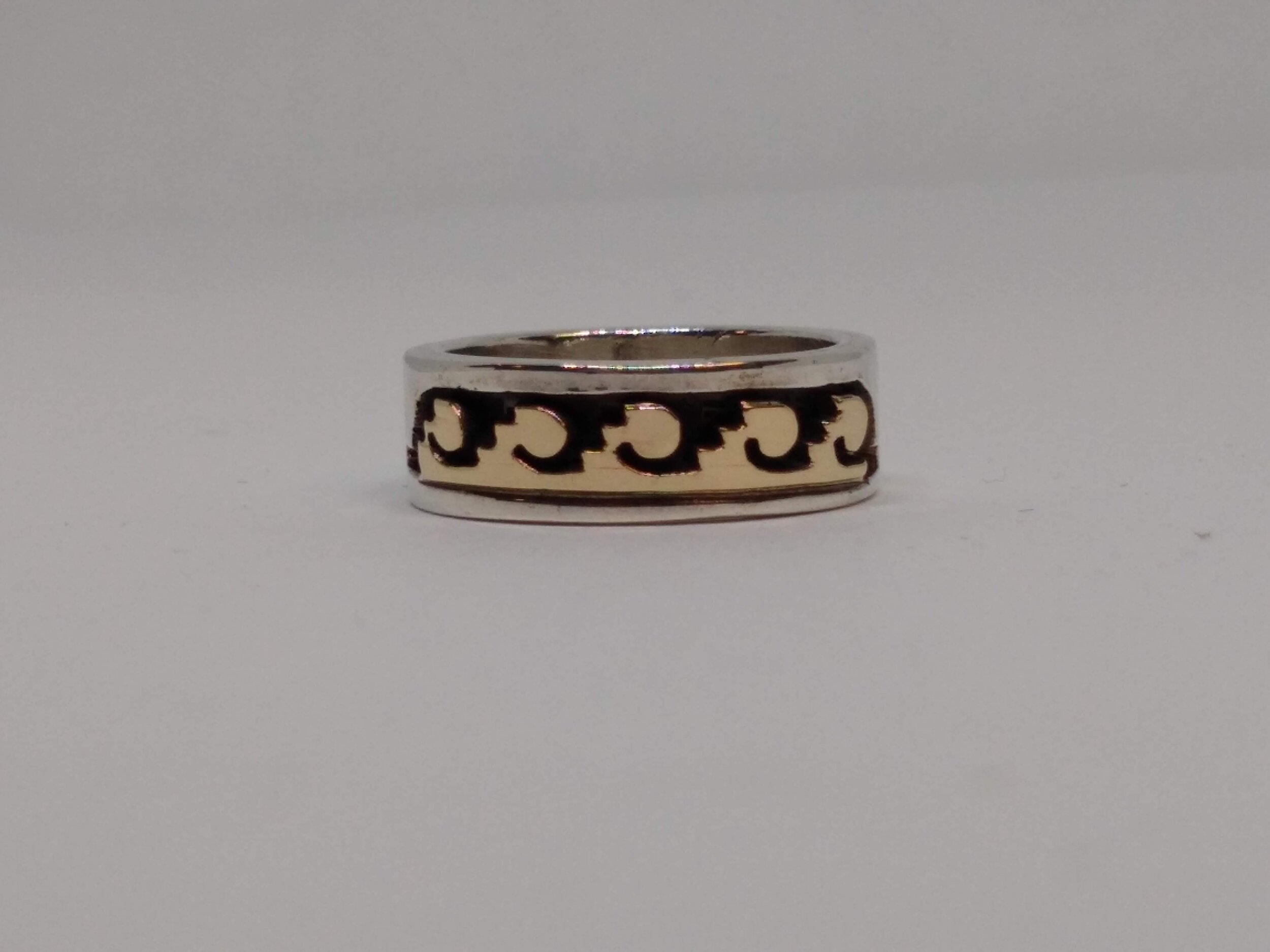 Scott Skeets, Navajo, Sterling Silver Band w/ 14K Yellow Gold Accents. Size 5.5