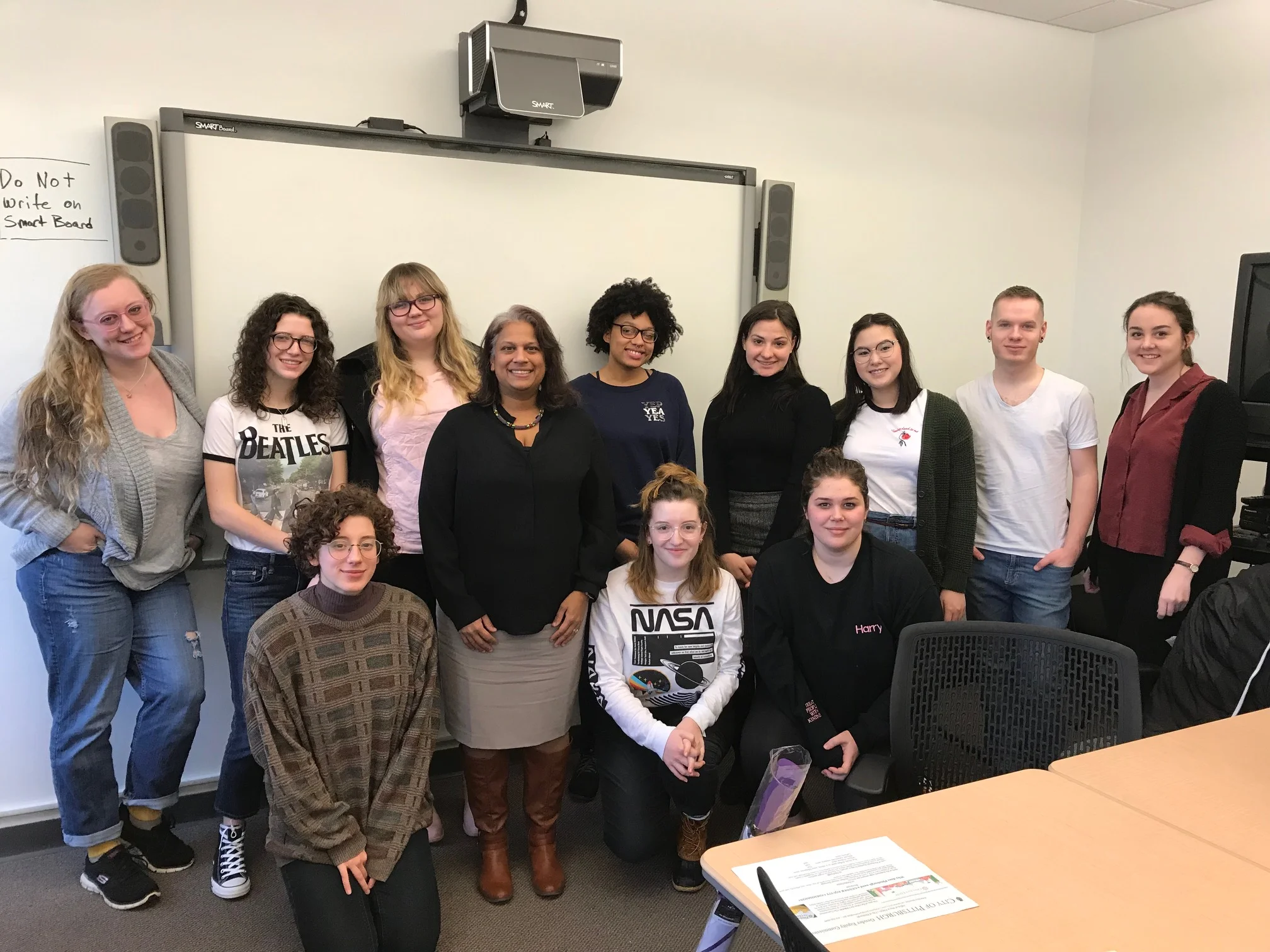 Students with visiting speaker Dr. anu jain, fourth standing from left.