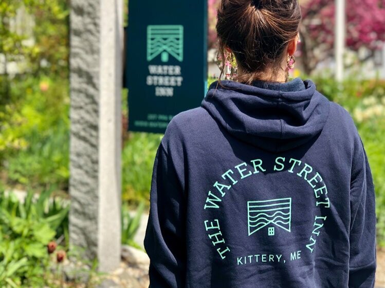 Fleece hoodie with Water Street badge logo on the back