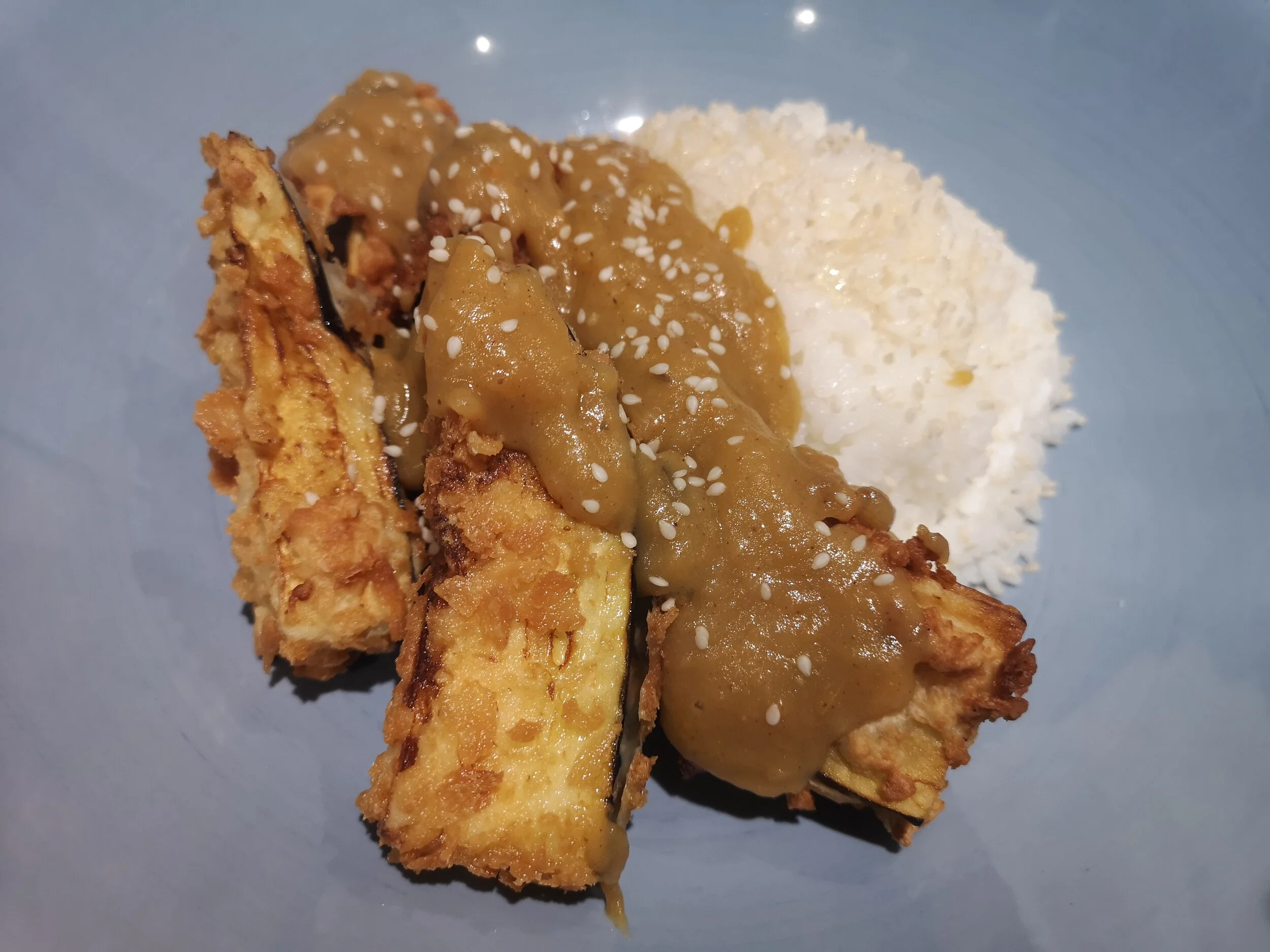 Aubergine katsu and sushi rice.