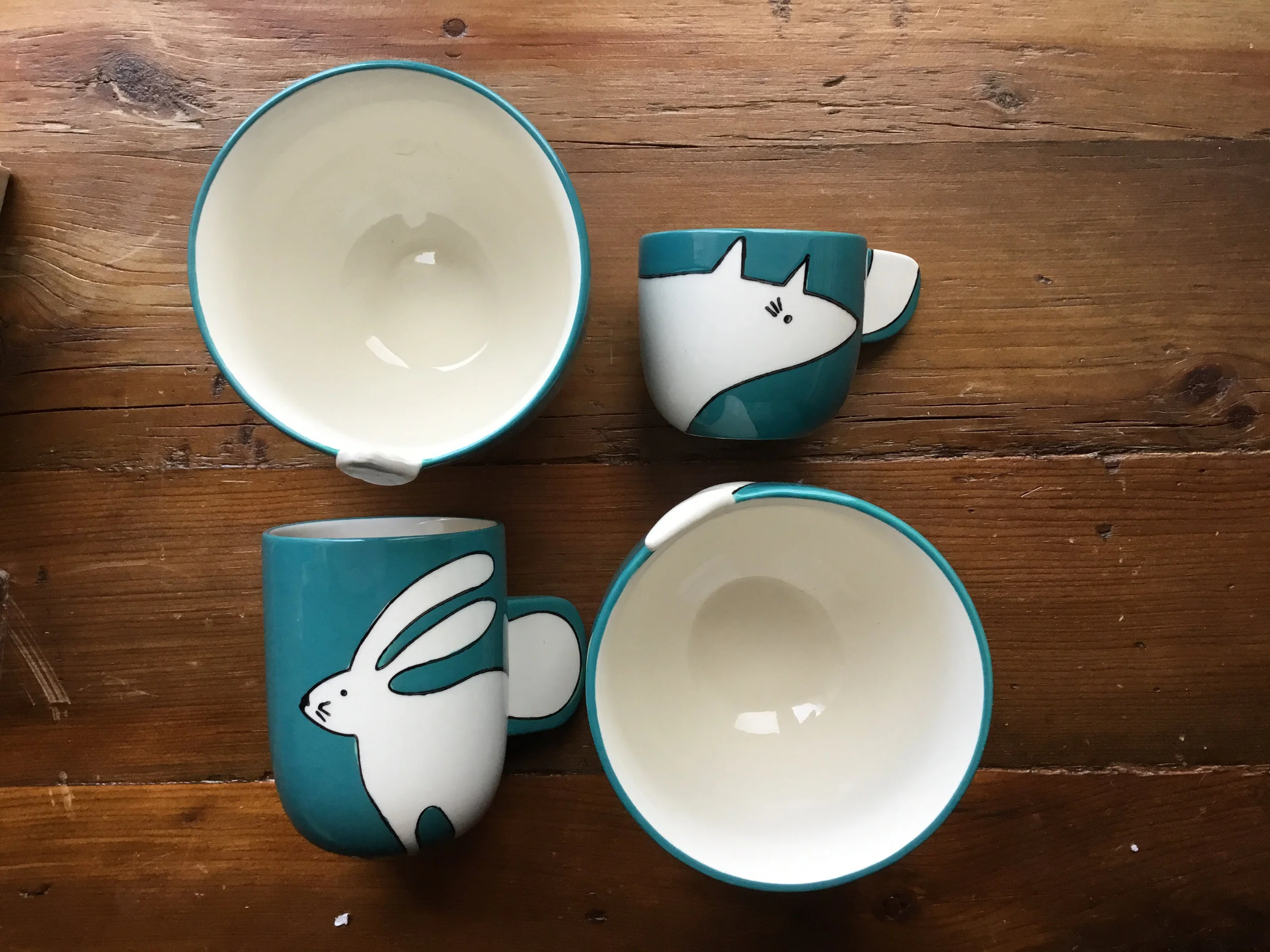 blue white rabbit fox mugs.jpg