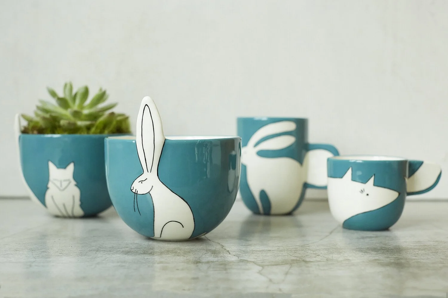 hand painted blue animal mugs.jpg