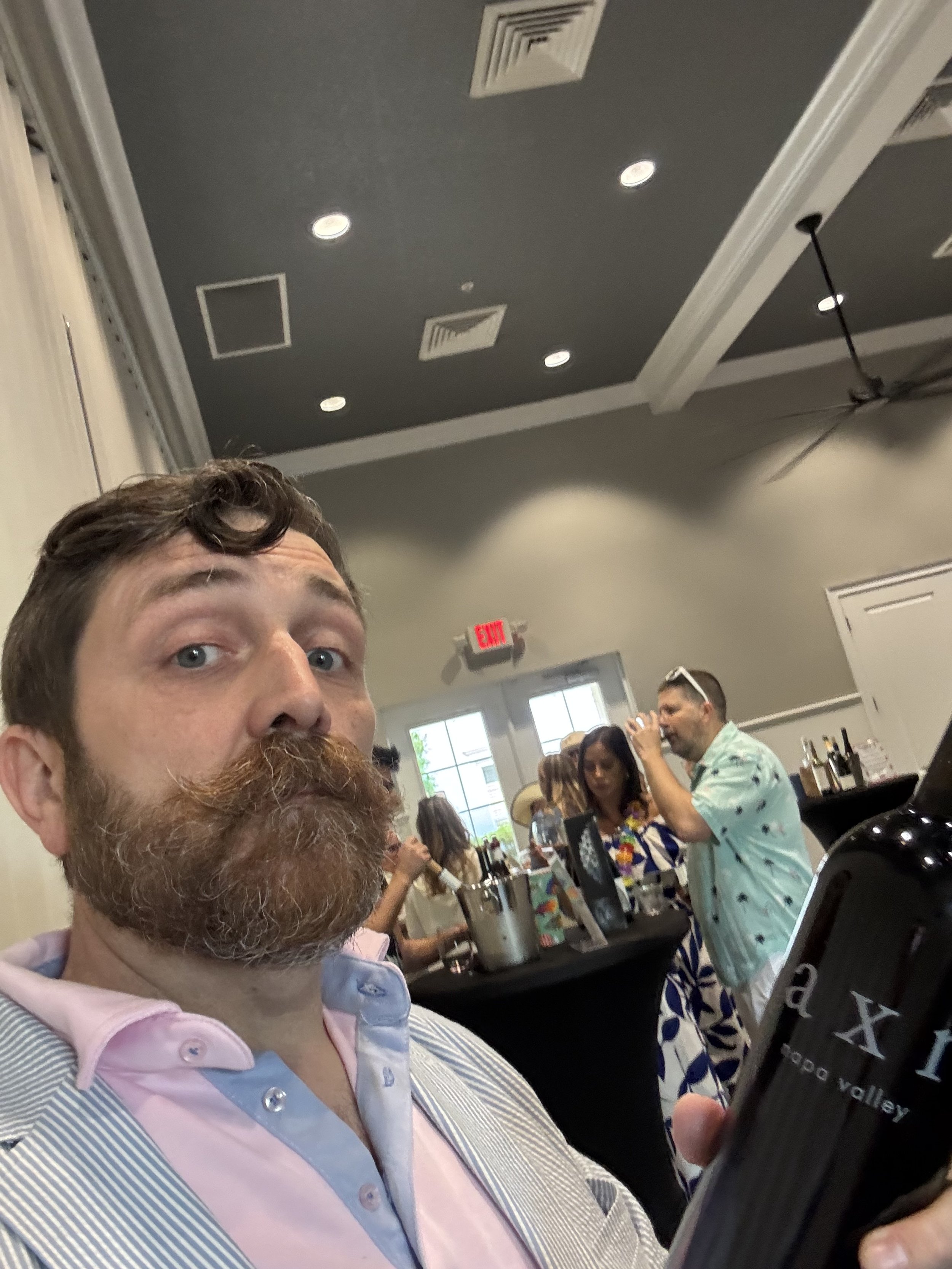 Pouring AXR Napa Valley at a wine tasting event