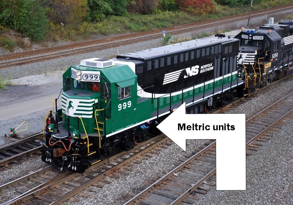 Norfolk Southern all electric locomotive charged with Meltric devices. 