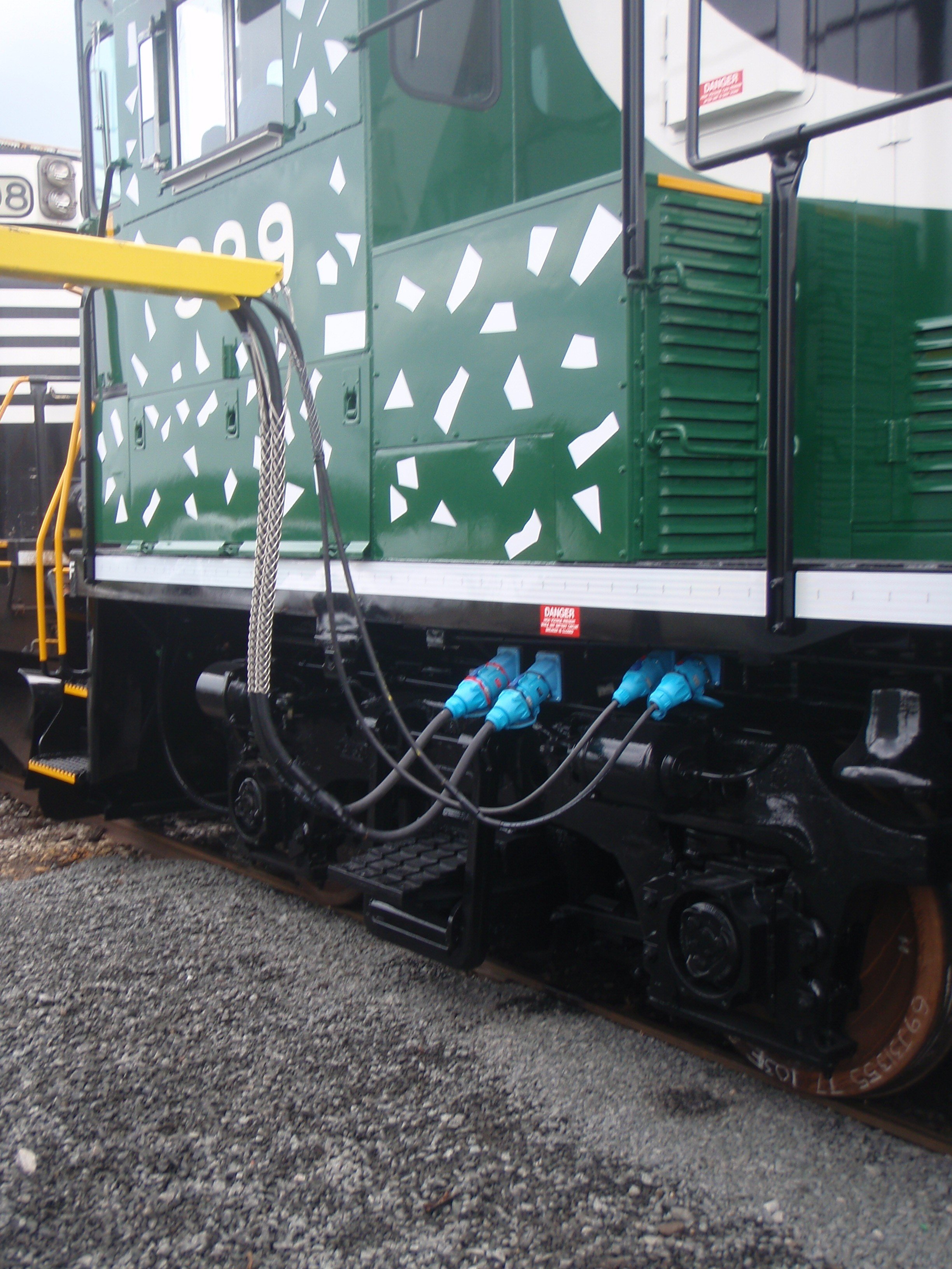 Norfolk Southern all electric locomotive charged by Meltric devices.