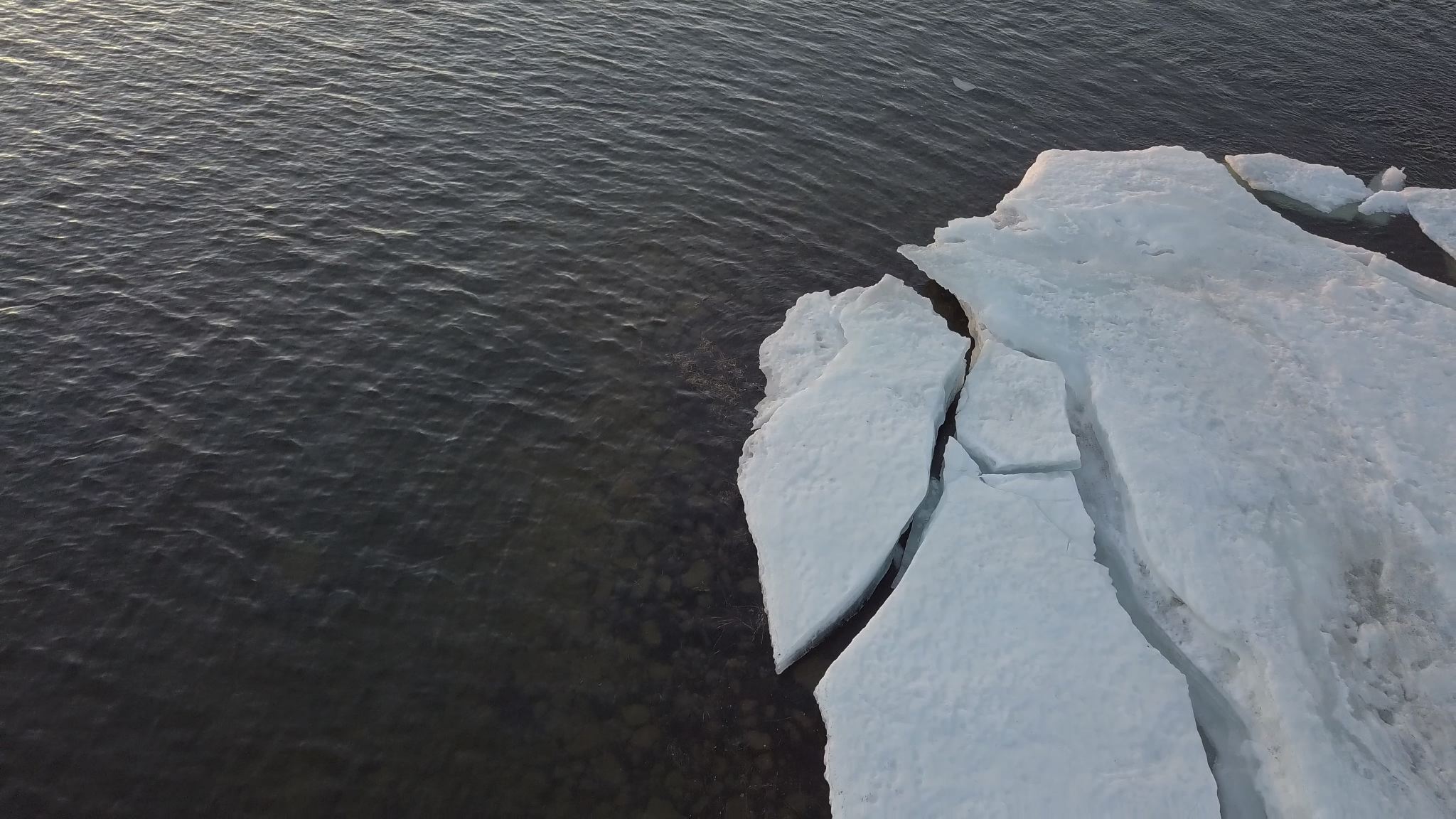  In spring, the ice starts to melt on Black Lake, Saskatchewan. 