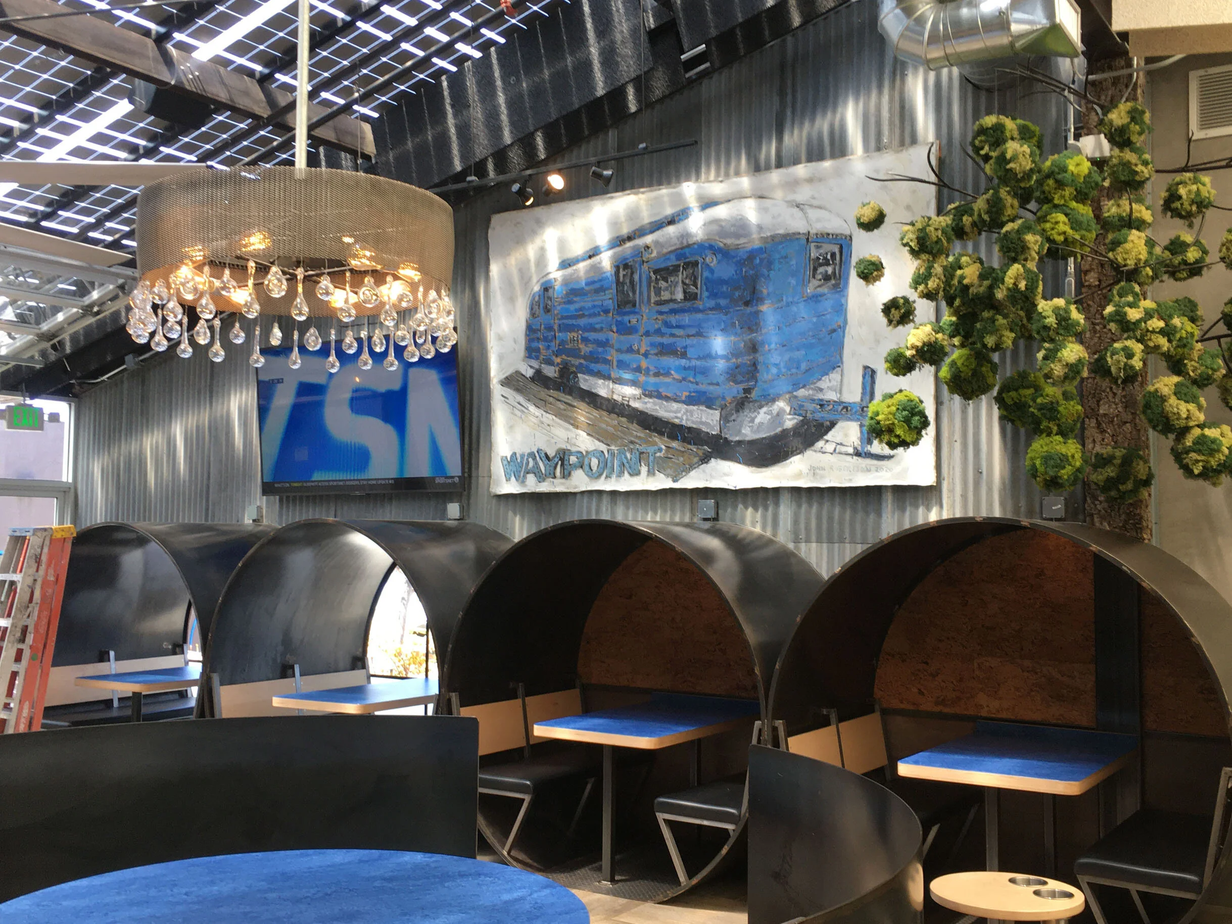 Large-scale painting of a vintage RV trailer at Transmission Brewing in Ventura, California.