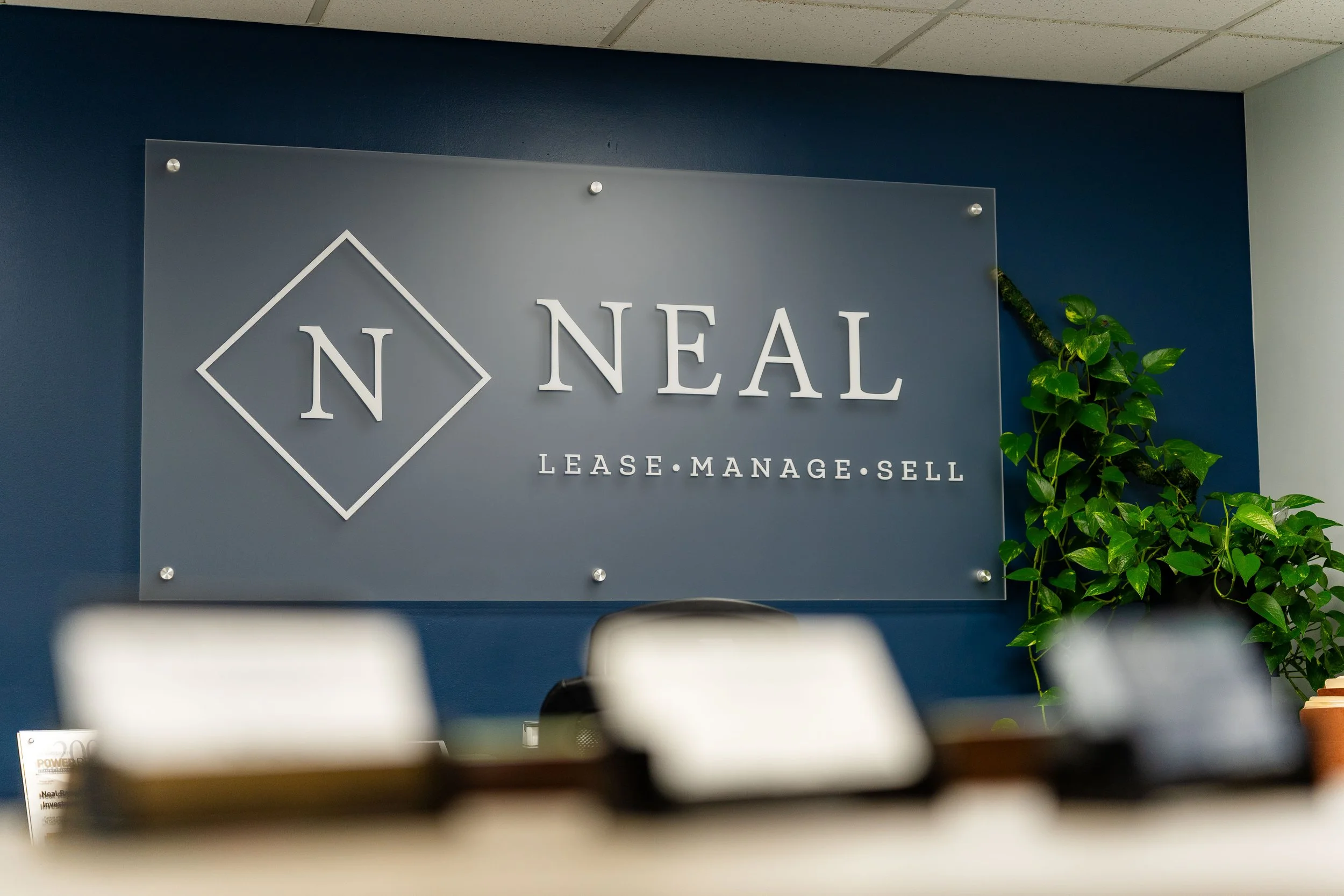Neal Realty & Investments office sign