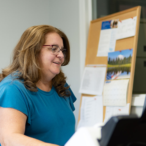 Neal Realty team member working in the office