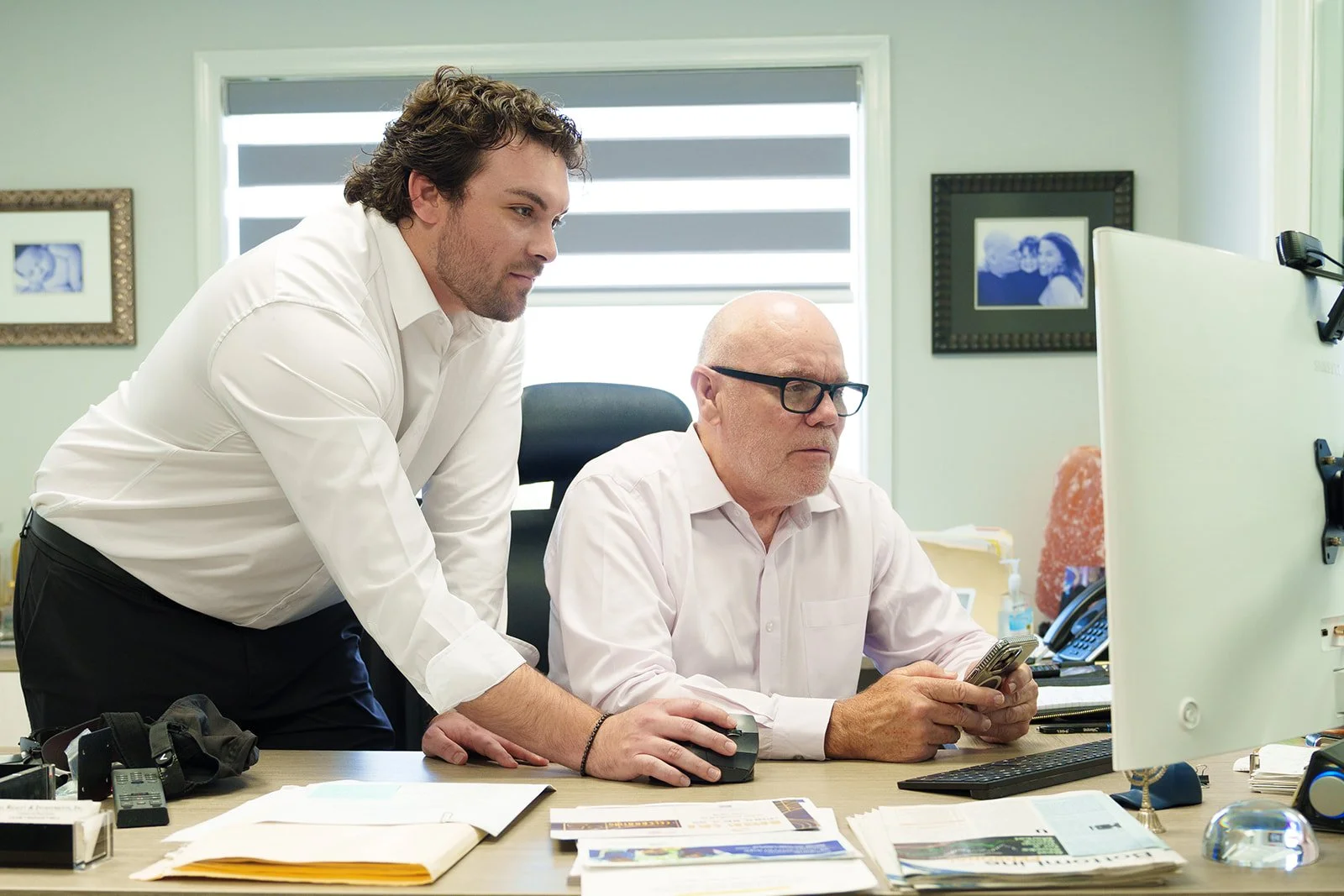 Tim Neal and Neal Realty team members discussing commercial property plans