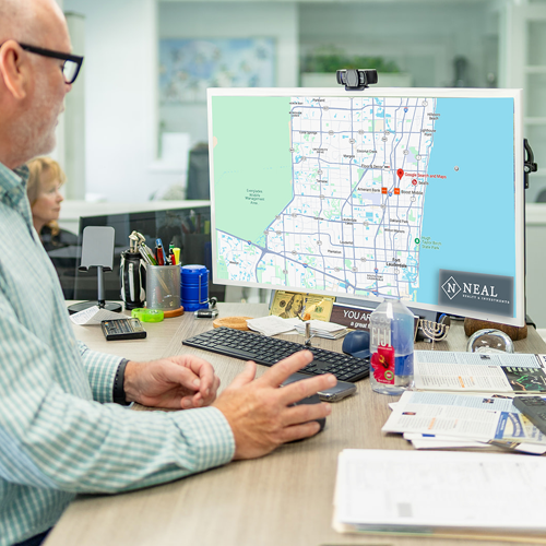 Neal Realty team reviewing South Florida commercial property locations