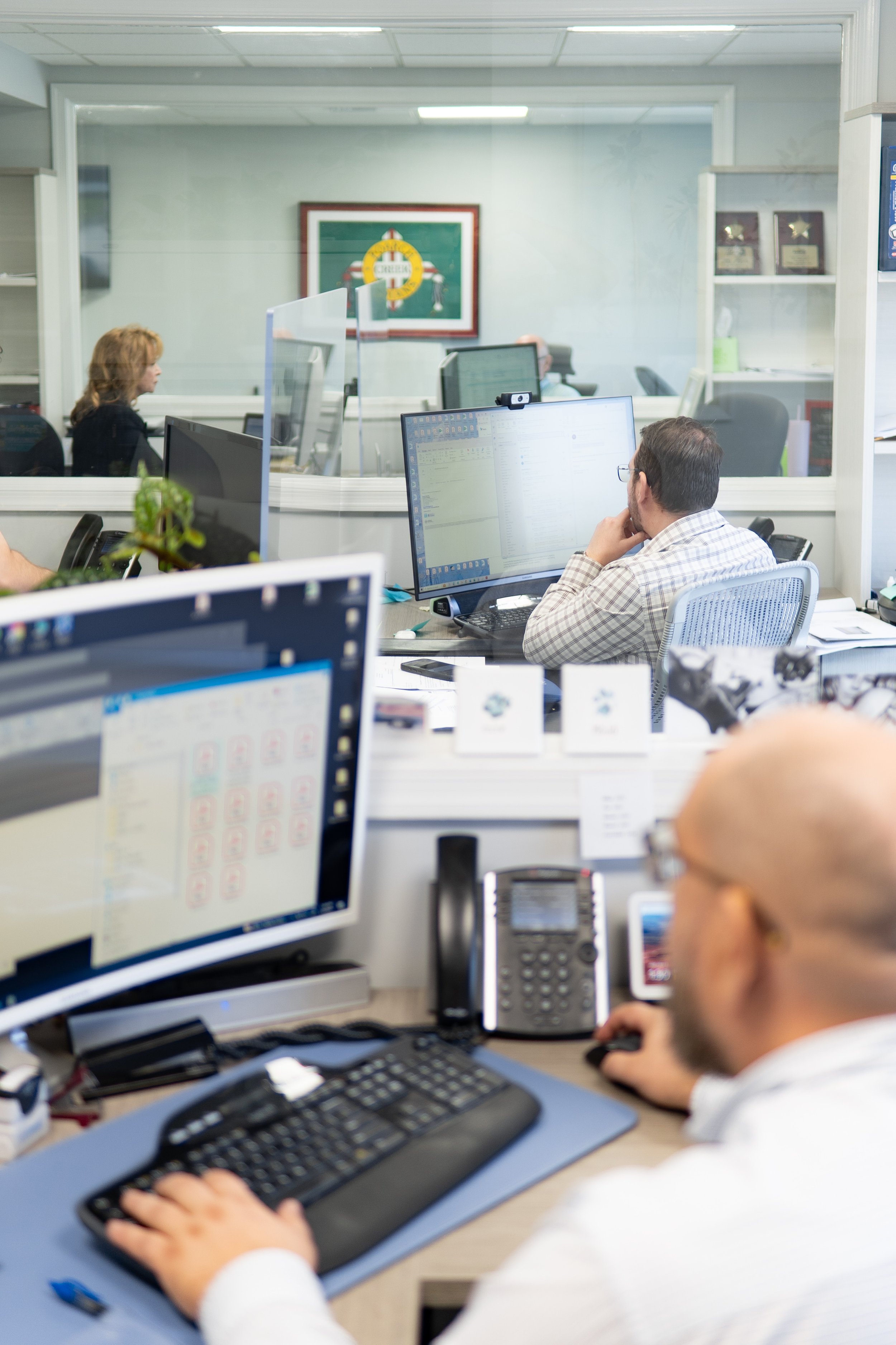 Neal Realty staff working in the office