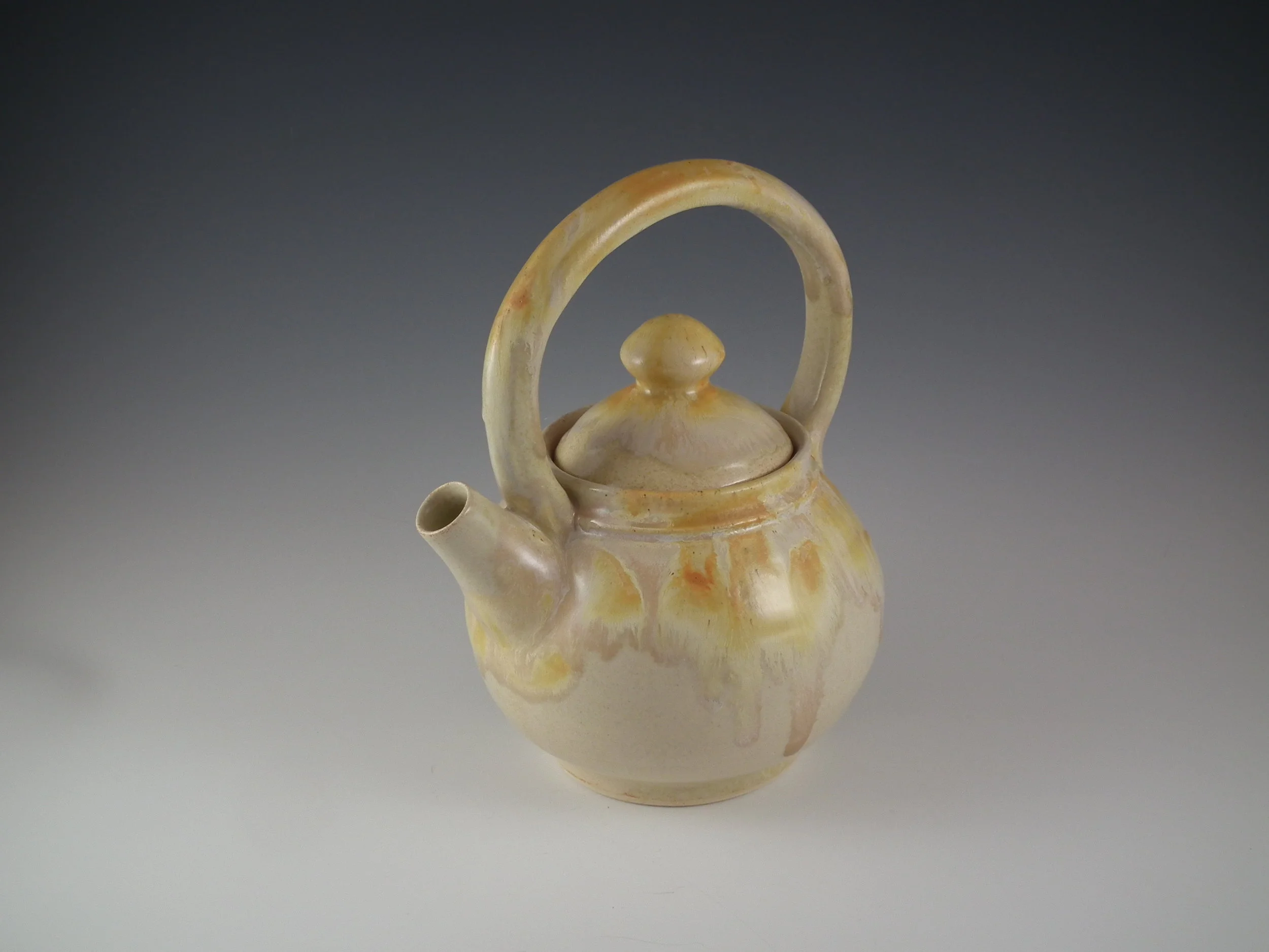  Teapot, stoneware, butter glaze with wash. 
