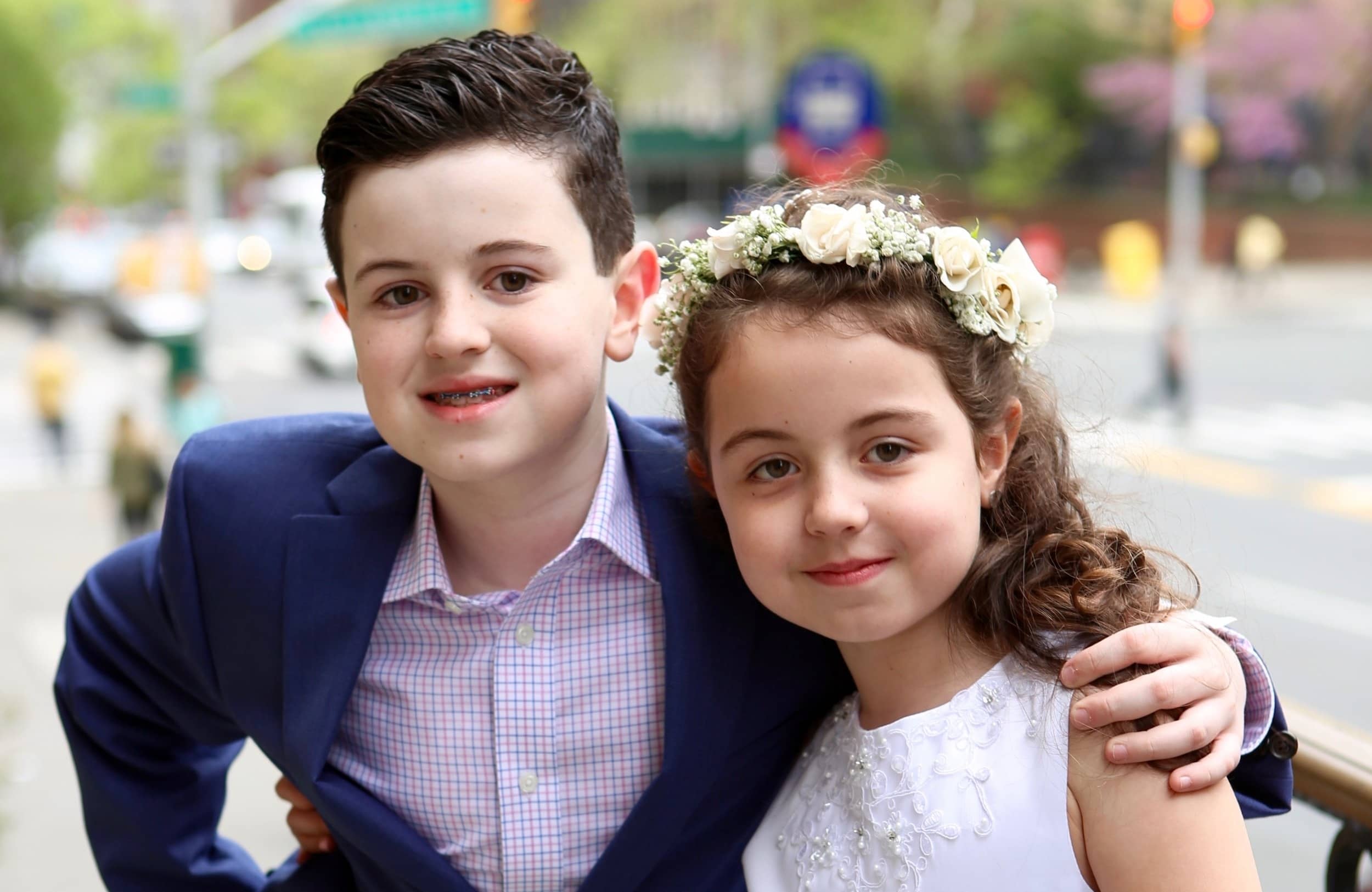 first-communion-kids-arms-around-st-francis-de-sales-church-new-york-city.jpg