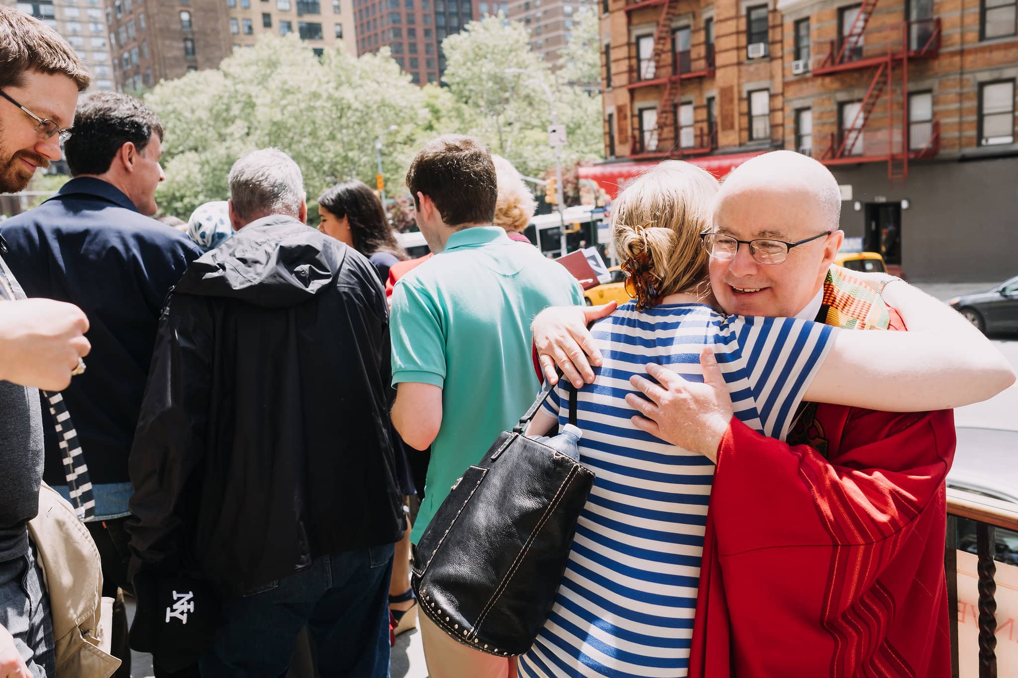 hugs-welcome-family-community-st-francis-de-sales-church-new-york-city.jpg