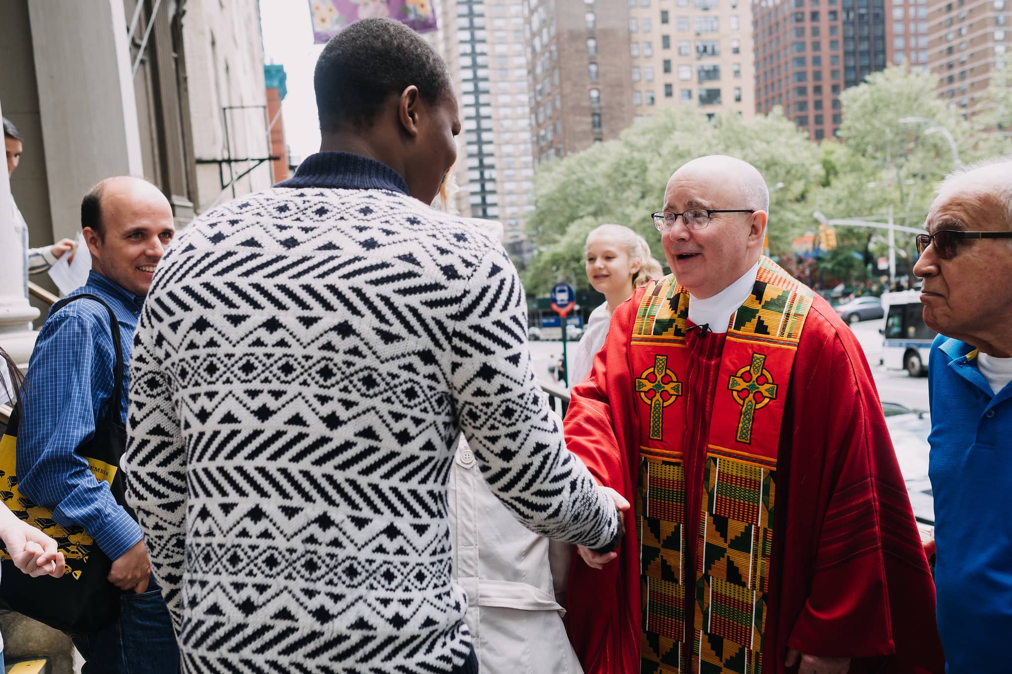 handshake-diversity-welcome-everyone-mass-st-francis-de-sales-church-new-york-city.jpg