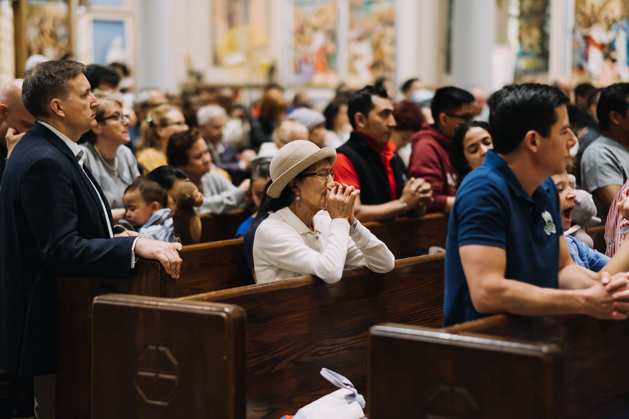 prayer-together-senior-elderly-diverse-mass-st-francis-de-sales-church-new-york-city.jpg