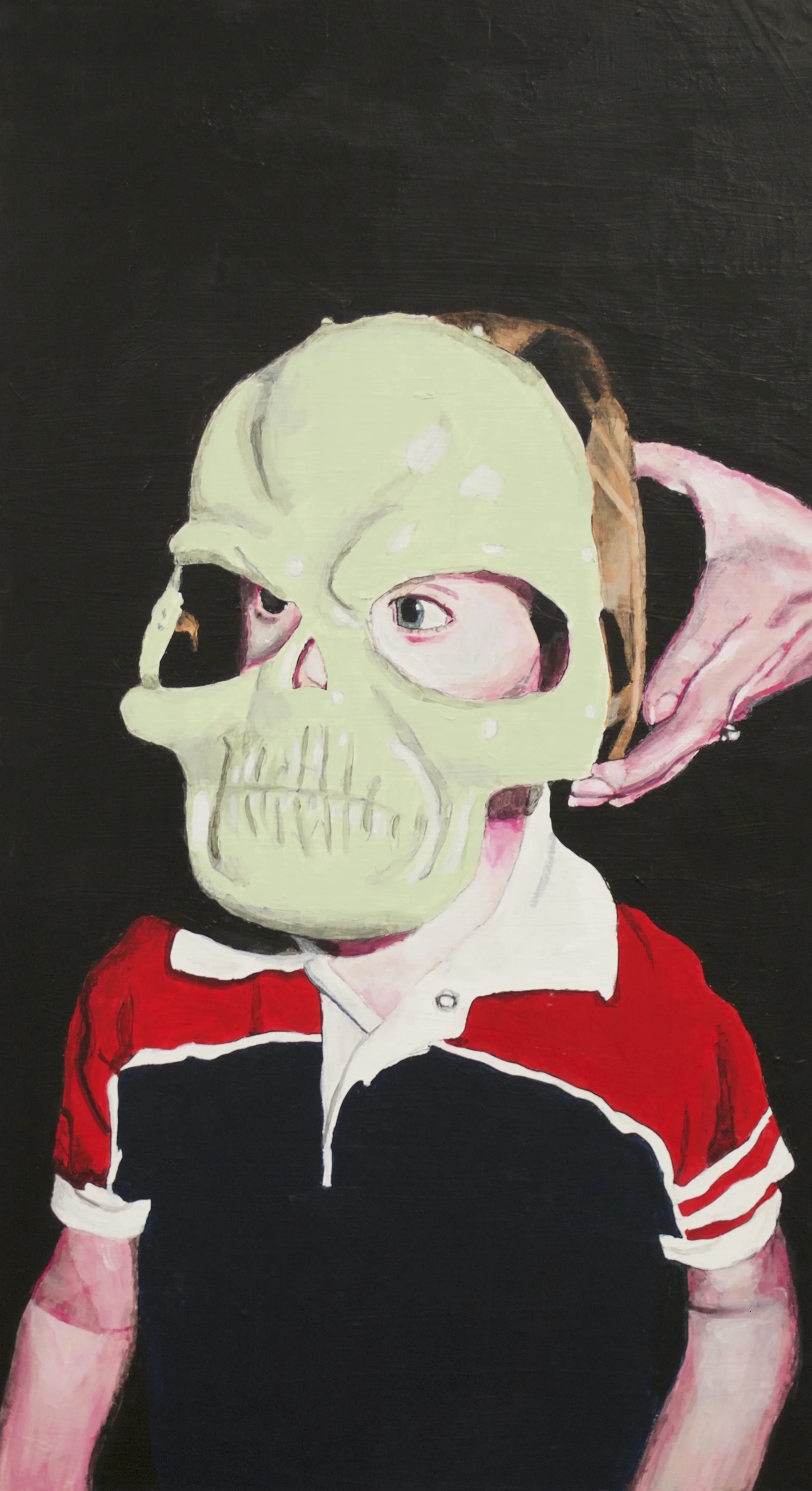 Matthew Tyler Jones as a child watches a war in the maze and asks his mother to put a mask over his face.