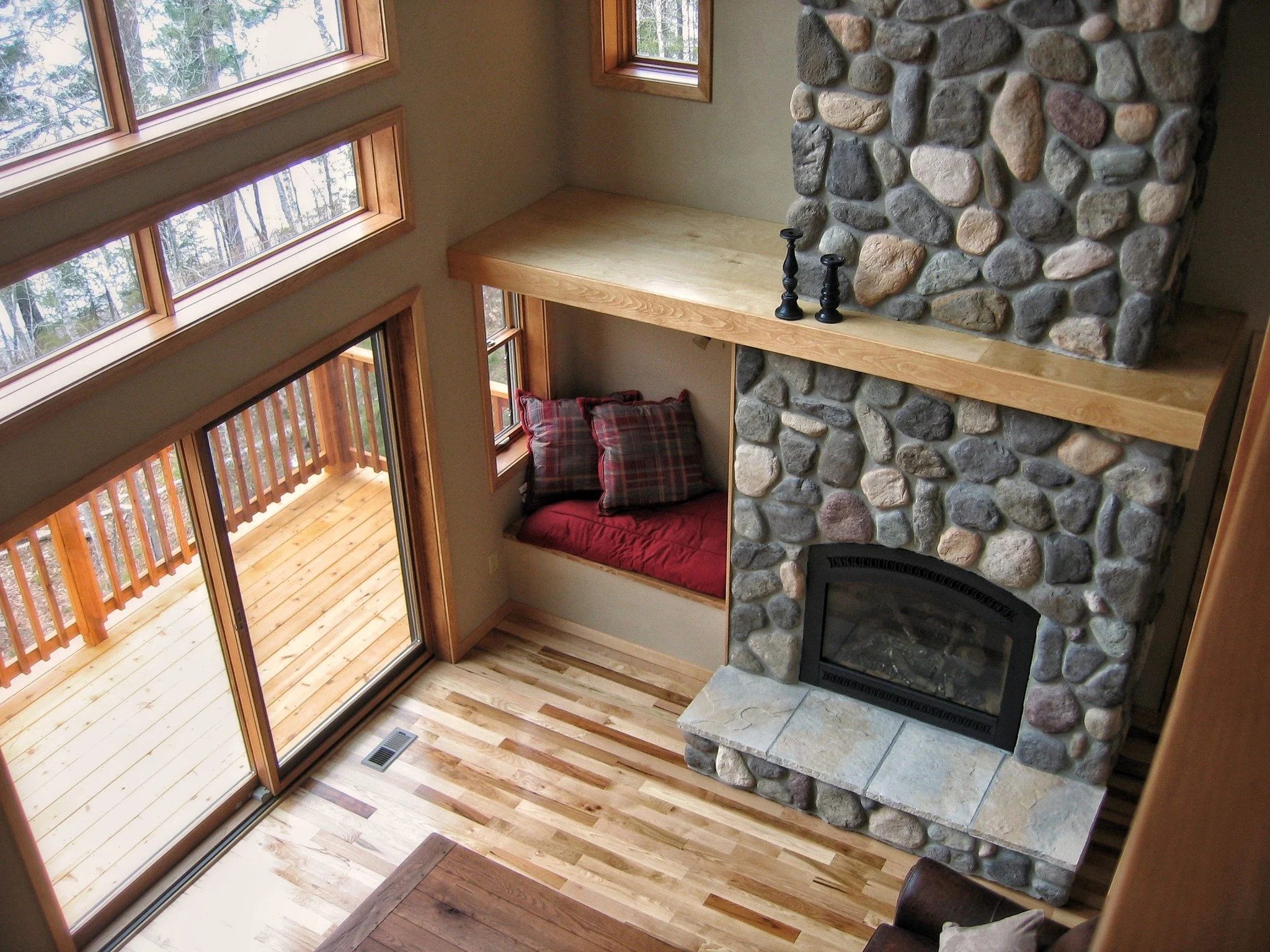 A seat by the window, a fire nearby, and room built for cozy moments.

#sauterbuilders #energyefficienthome #throwback #custombuilthome #boulderjunctionwi 
Keywords: Past build, Throwback, Construction, Sauter Builders, Boulder Junction Construction 