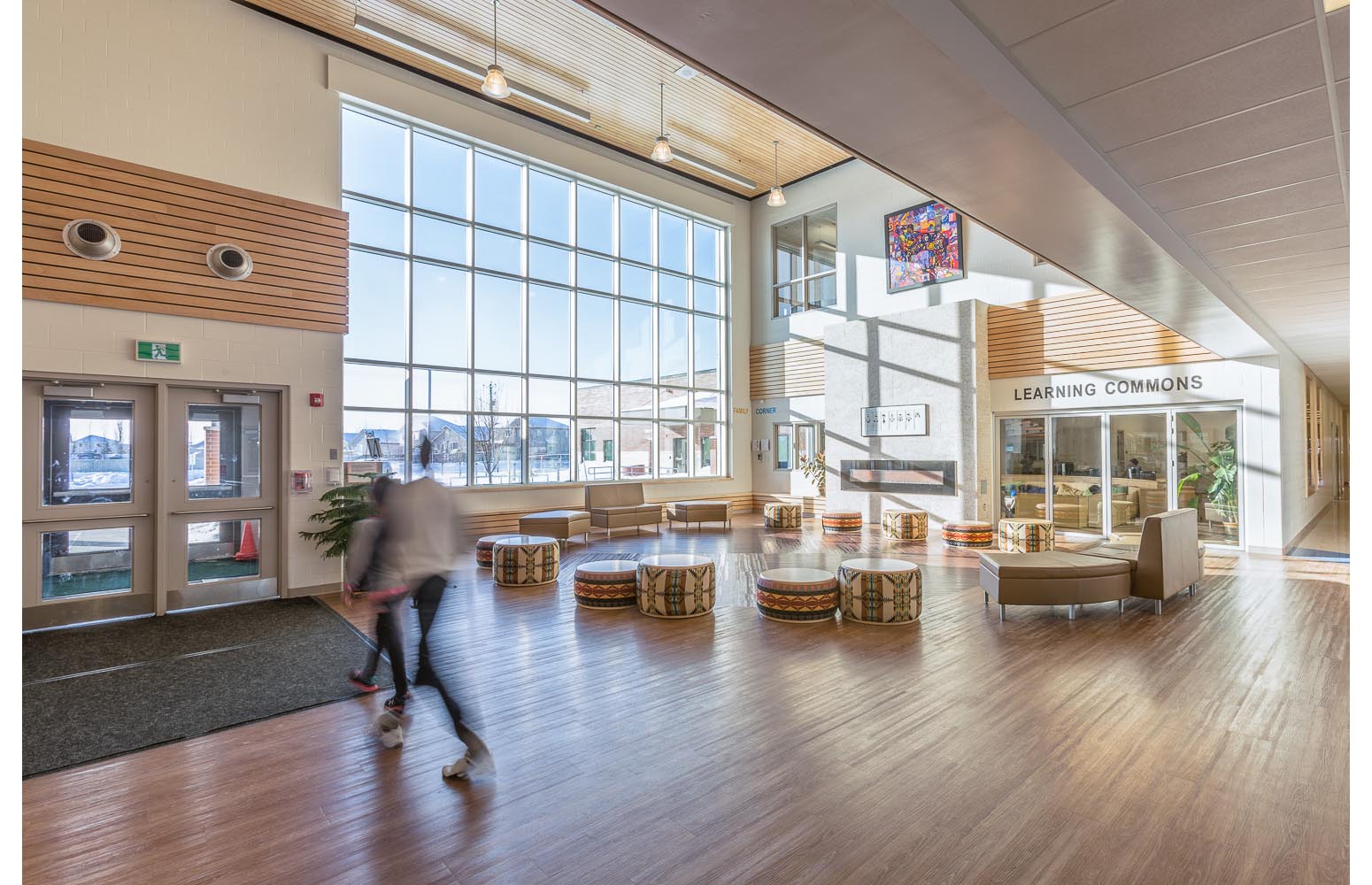  Amber Trails Community School, interior photo of front entrance with children walking / Photo:  Lindsay Reid  