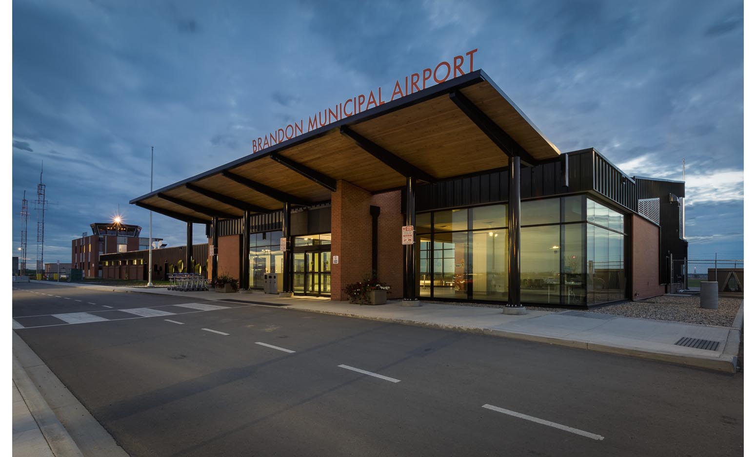  Brandon Municipal Airport, exterior photo of building at dusk / Photo:  Lindsay Reid  