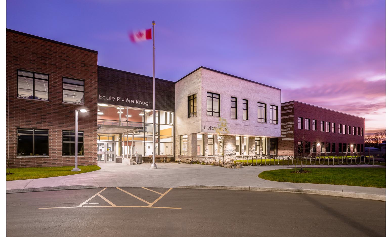  Ecole Rivière Rouge Elementary, exterior photo of school at sunrise / Photo:  Lindsay Reid  