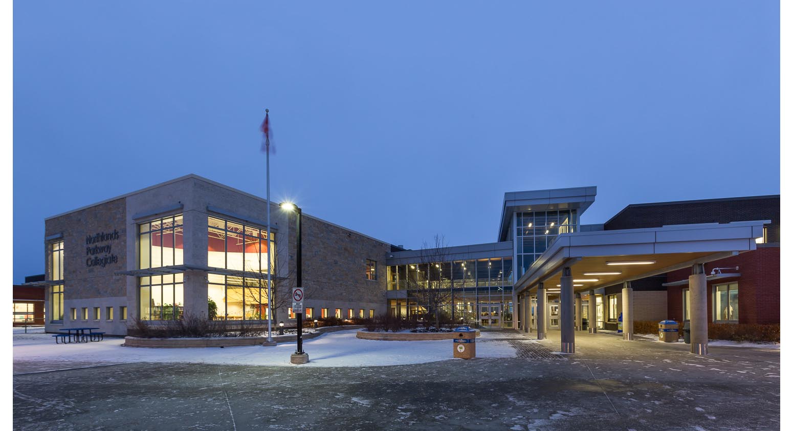  Northlands Parkway Collegiate, exterior photo of building at dusk / Photo:  Lindsay Reid  