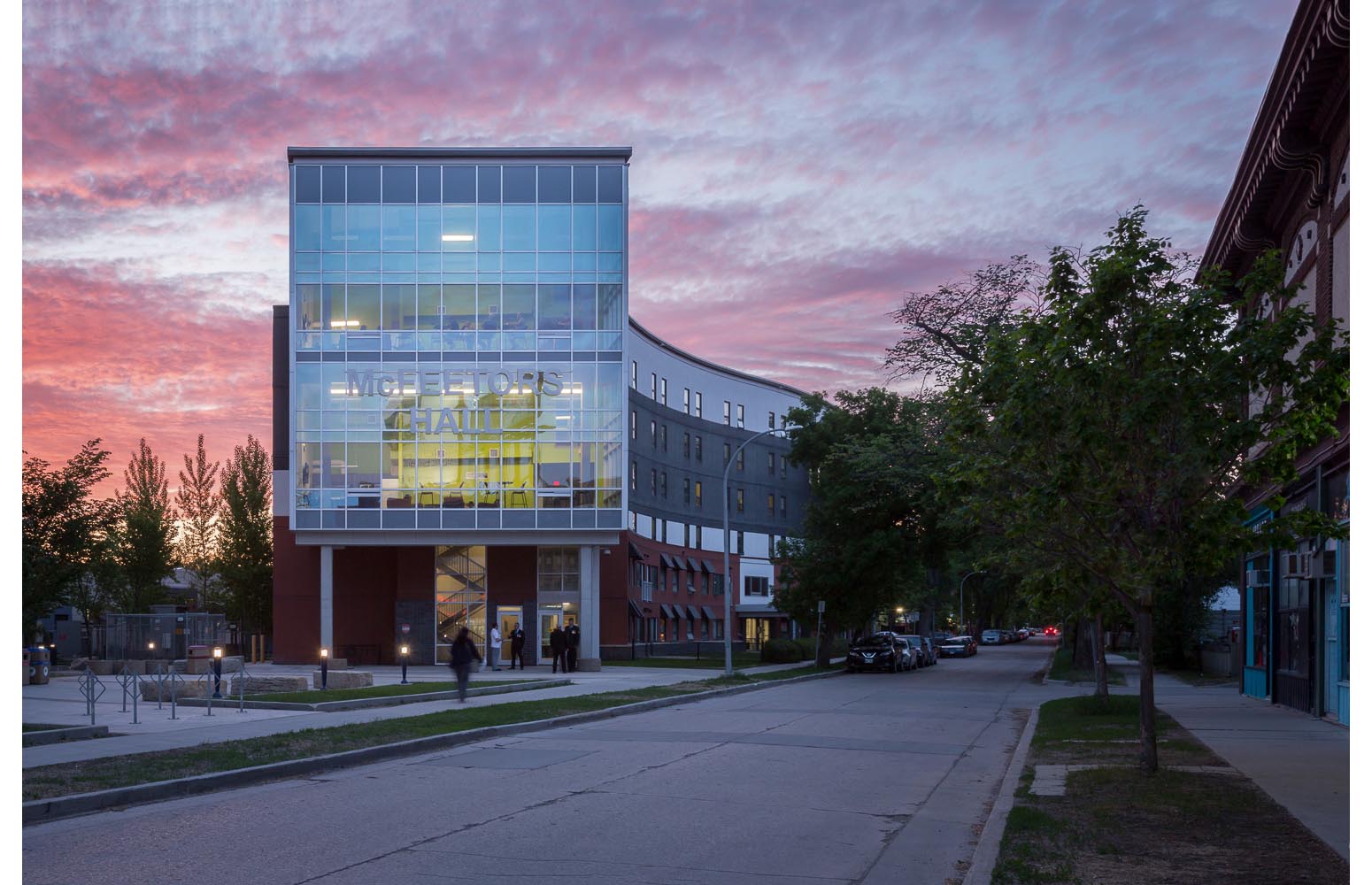  U of W Housing (McFeetor’s Hall), exterior photo of building at sunset / Photo:  Lindsay Reid  